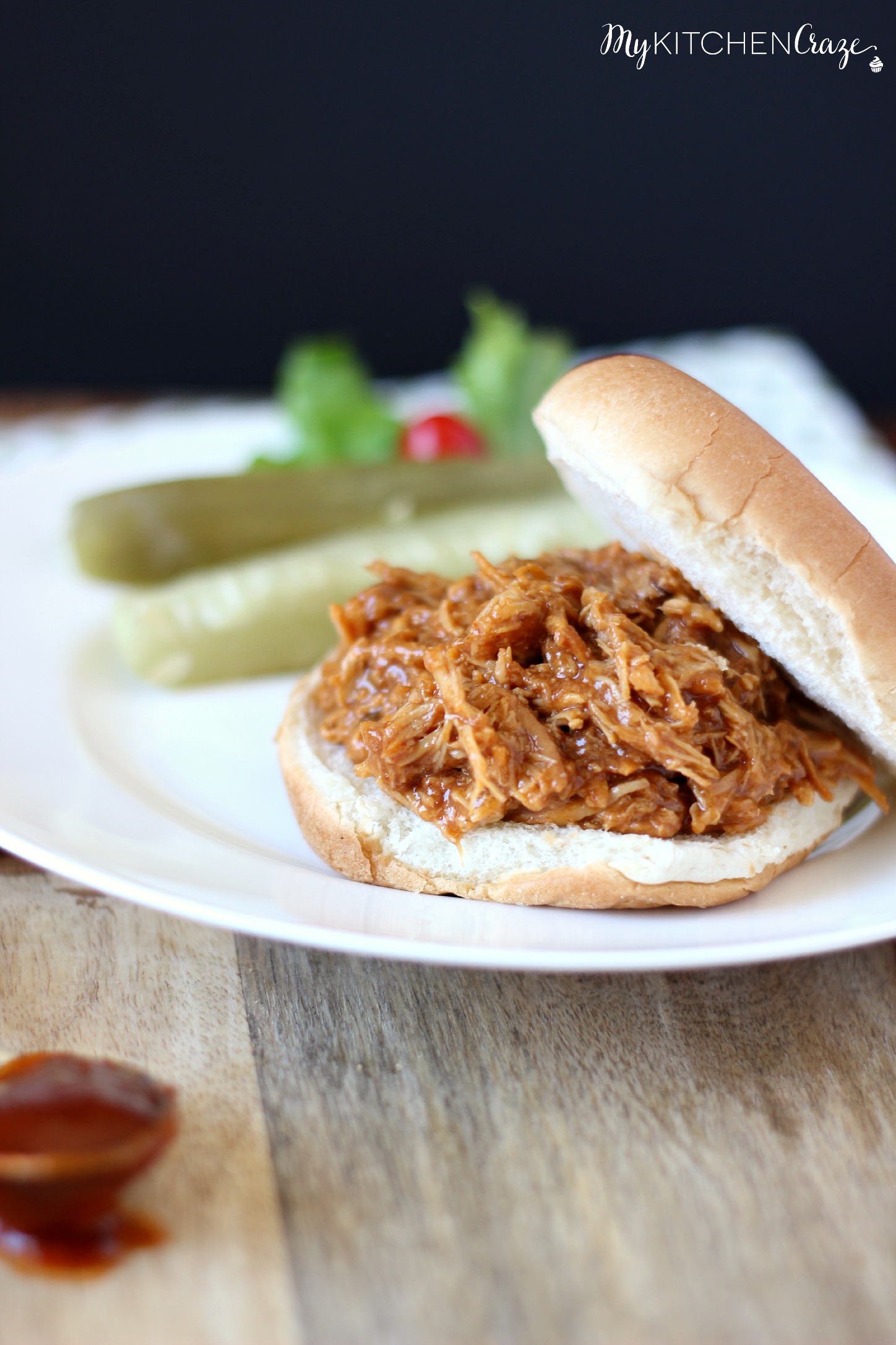 BBQ Pulled Chicken Sliders ~ An American classic, the chicken is slow cooked with Barbecue sauce then shredded or 'pulled' and piled on top of rolls. Perfect for that special gathering or just because ~ www.mykitchencraze.com