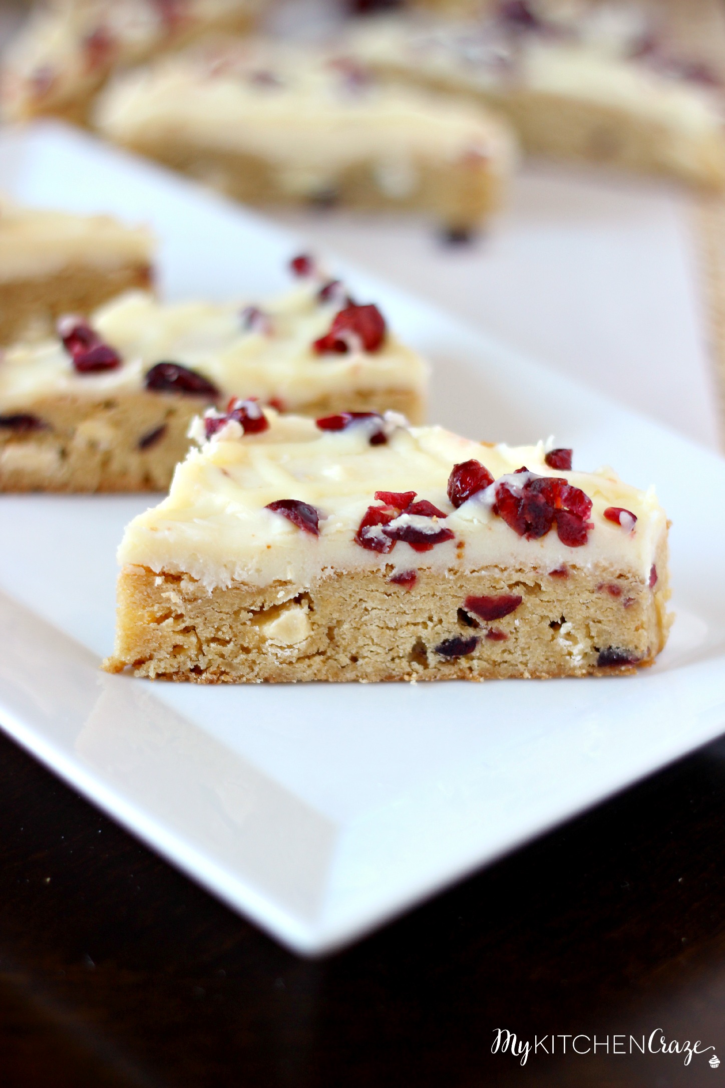 Cranberry Bliss Bars ~ A soft blondie bar with white chocolates, cranberries and covered in cream cheese frosting. Perfect treat for any occasion! ~ www.mykitchencraze.com