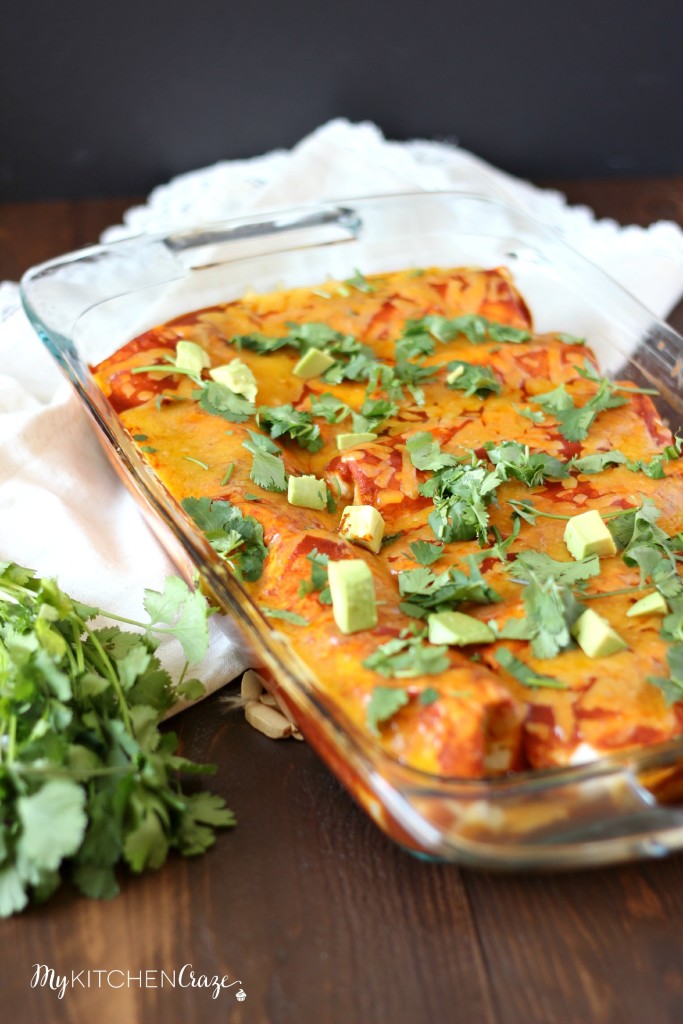 Chicken & Sweet Potato Enchiladas ~ www.mykitchencraze.com ~ Tortillas filled with chicken, sweet potatoes and black beans, then smothered in enchilada sauce and cheese! Delicious!