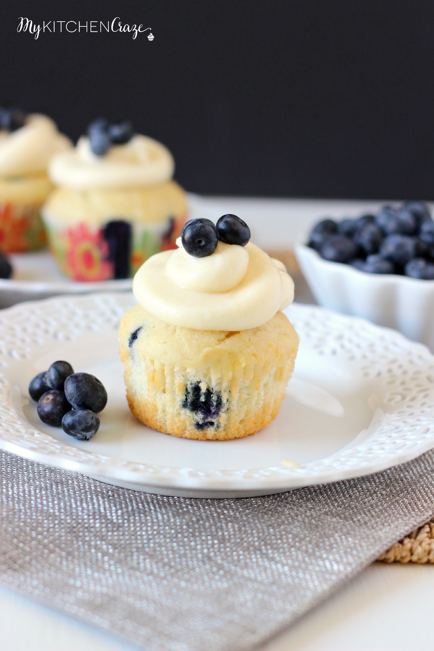 Lemon Blueberry Cupcakes ~ mykitchencraze.com ~ A moist cupcake filled with juicy blueberries and lemon zest. Topped with a delicious cream cheese frosting.