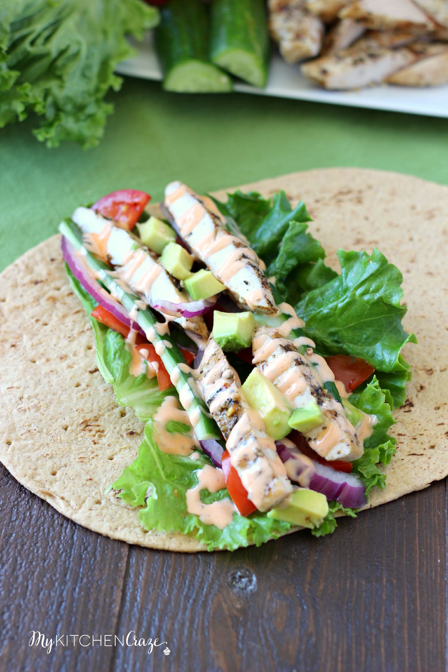 Buffalo Ranch Chicken Wrap ~ mykitchencraze.com ~ Grilled chicken smothered in buffalo ranch sauce, then added with your favorite vegetables and a wrap. Healthy, quick and delicious!