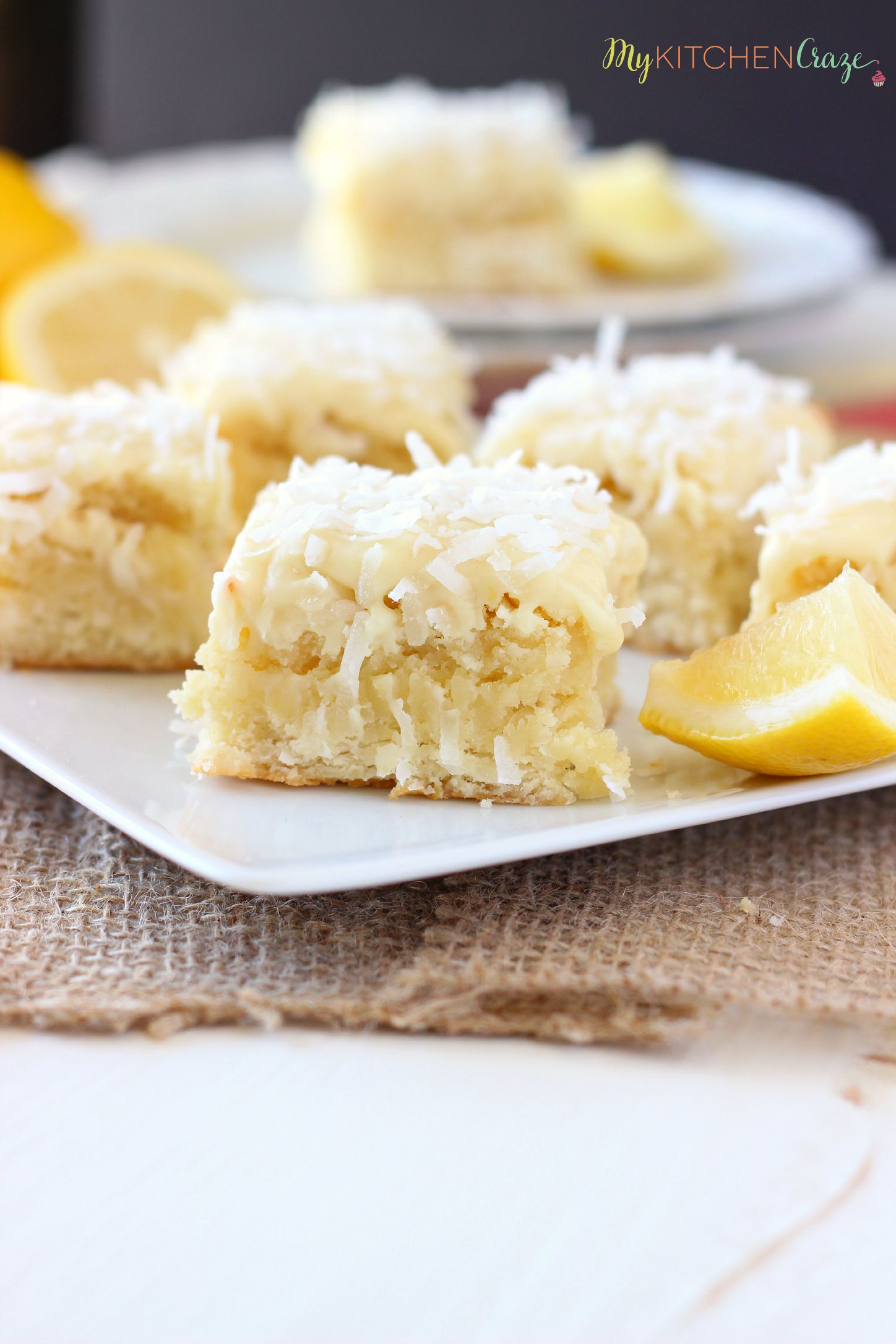 Coconut Lemon Blondies ~ mykitchencraze.com ~ Moist and flavorful coconut lemon blondies, frosted with a creamy white chocolate frosting. These blondies are great for any get together or just because. You'll love them!