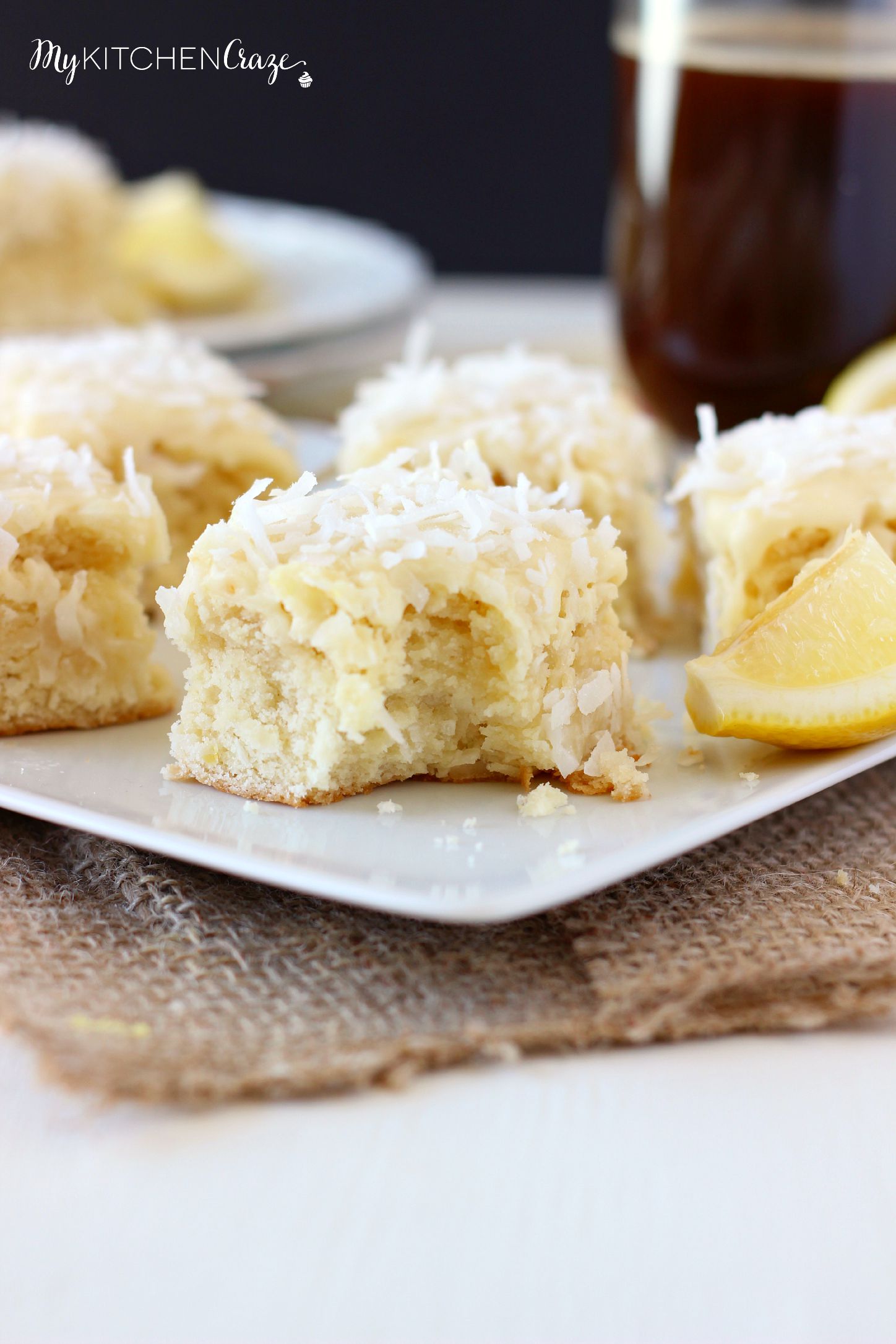 Coconut Lemon Blondies ~ mykitchencraze.com ~ Moist and flavorful coconut lemon blondies, frosted with a creamy white chocolate frosting. These blondies are great for any get together or just because. You'll love them!