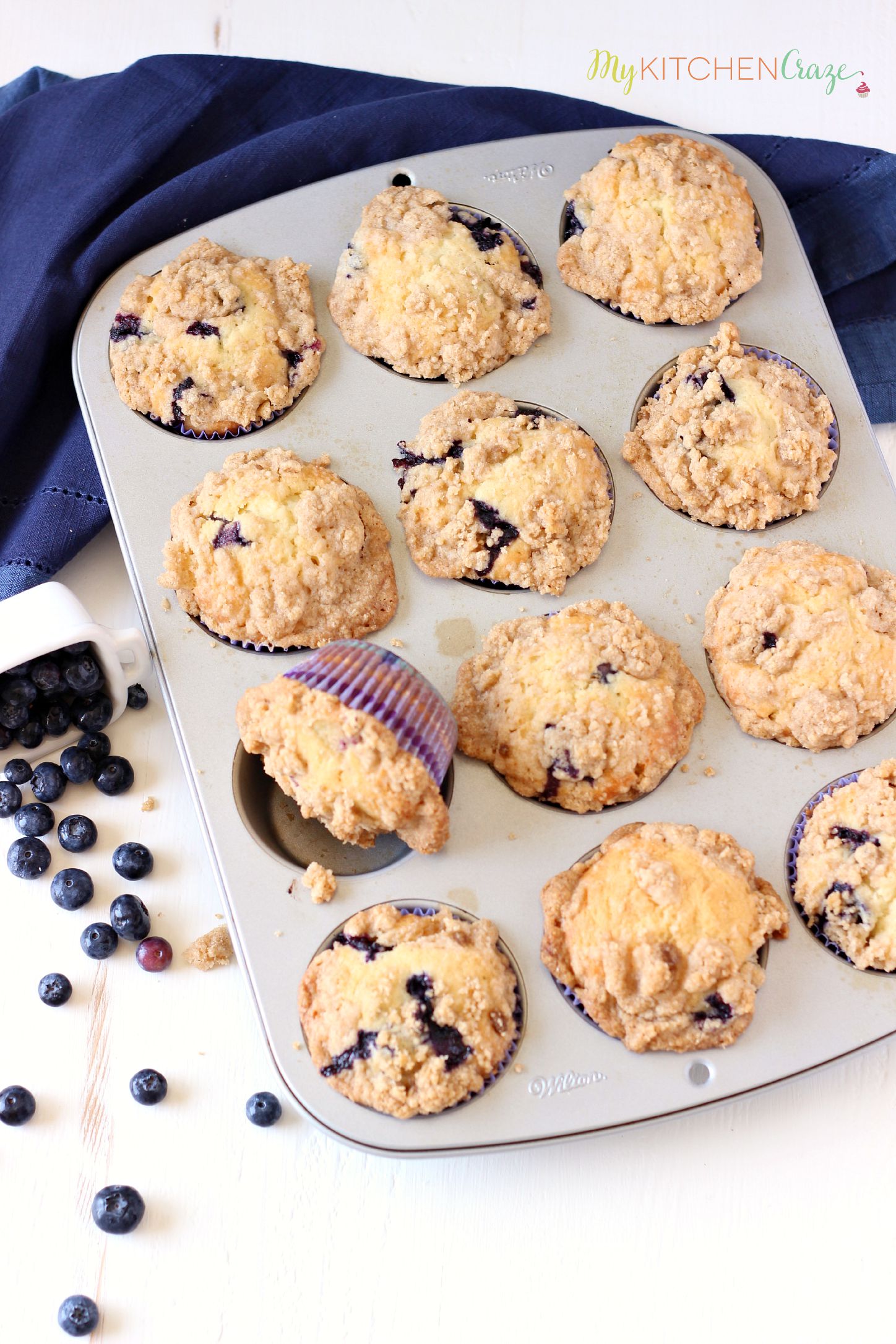 Blueberry Crumb Muffins ~ mykitchencraze.com ~ Muffins are perfect for breakfast. These muffins are loaded with juicy blueberries then topped with a crumb topping.