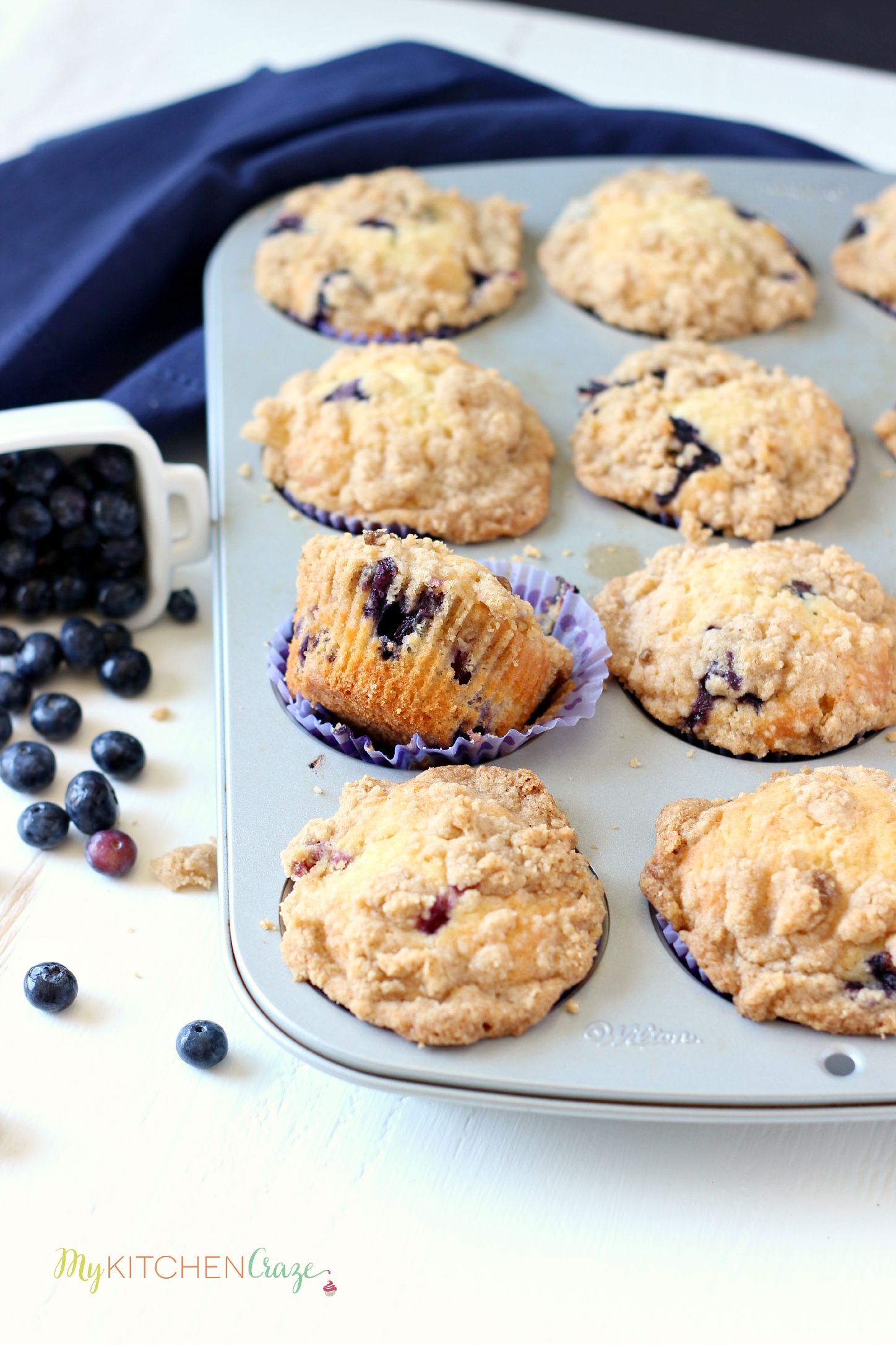 Blueberry Crumb Muffins ~ mykitchencraze.com ~ Muffins are perfect for breakfast. These muffins are loaded with juicy blueberries then topped with a crumb topping.