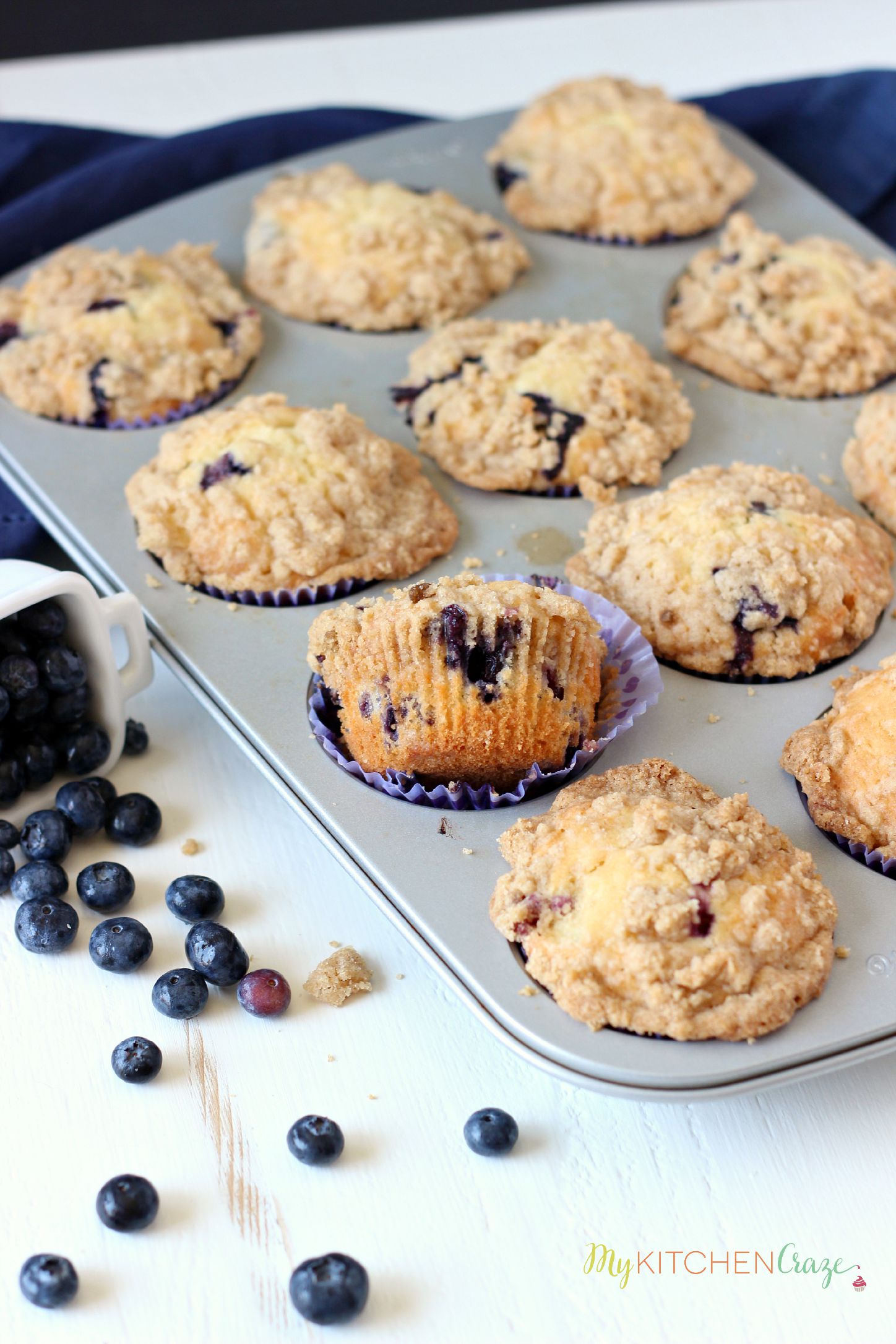 Blueberry Crumb Muffins ~ mykitchencraze.com ~ Muffins are perfect for breakfast. These muffins are loaded with juicy blueberries then topped with a crumb topping.