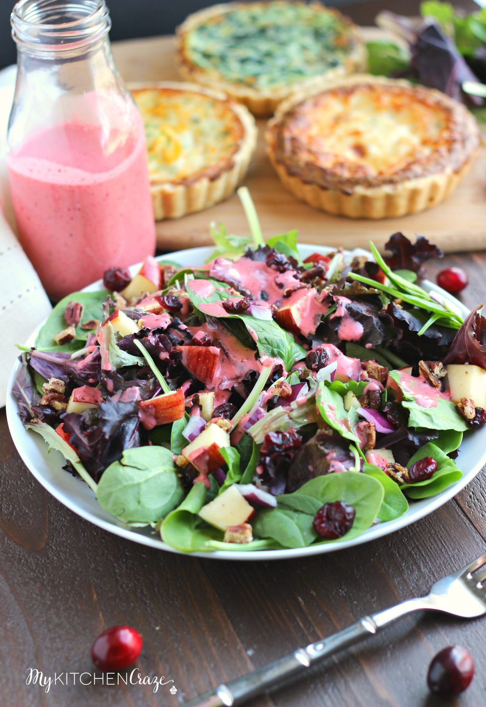 Cranberry Apple Spring Mix Salad ~ mykitchencraze.com ~ Enjoy this delicious holiday spring mix salad. Loaded with apples, pecans, dried cranberries and a decadent cranberry vinaigrette.