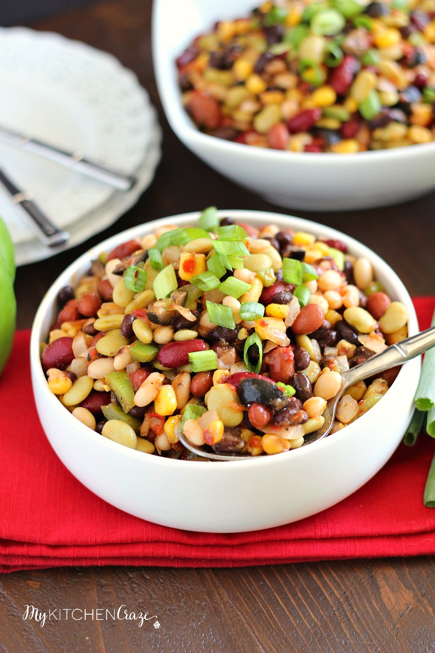 Colorful Bean Salad - A delicious array of flavors and beans brings this side dish to a whole new level. Plus it's easy to throw together on a busy night!