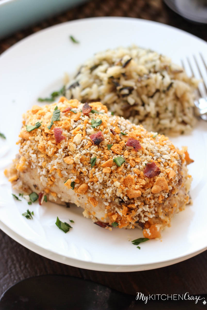 Spinach, Bacon & Cheese Stuffed Chicken ~ mykitchencraze.com ~ This Stuffed Chicken is a savory and delicious meal. Packed with spinach, bacon and cheese then topped with a crunchy topping. This dish is a sure crowd pleaser.