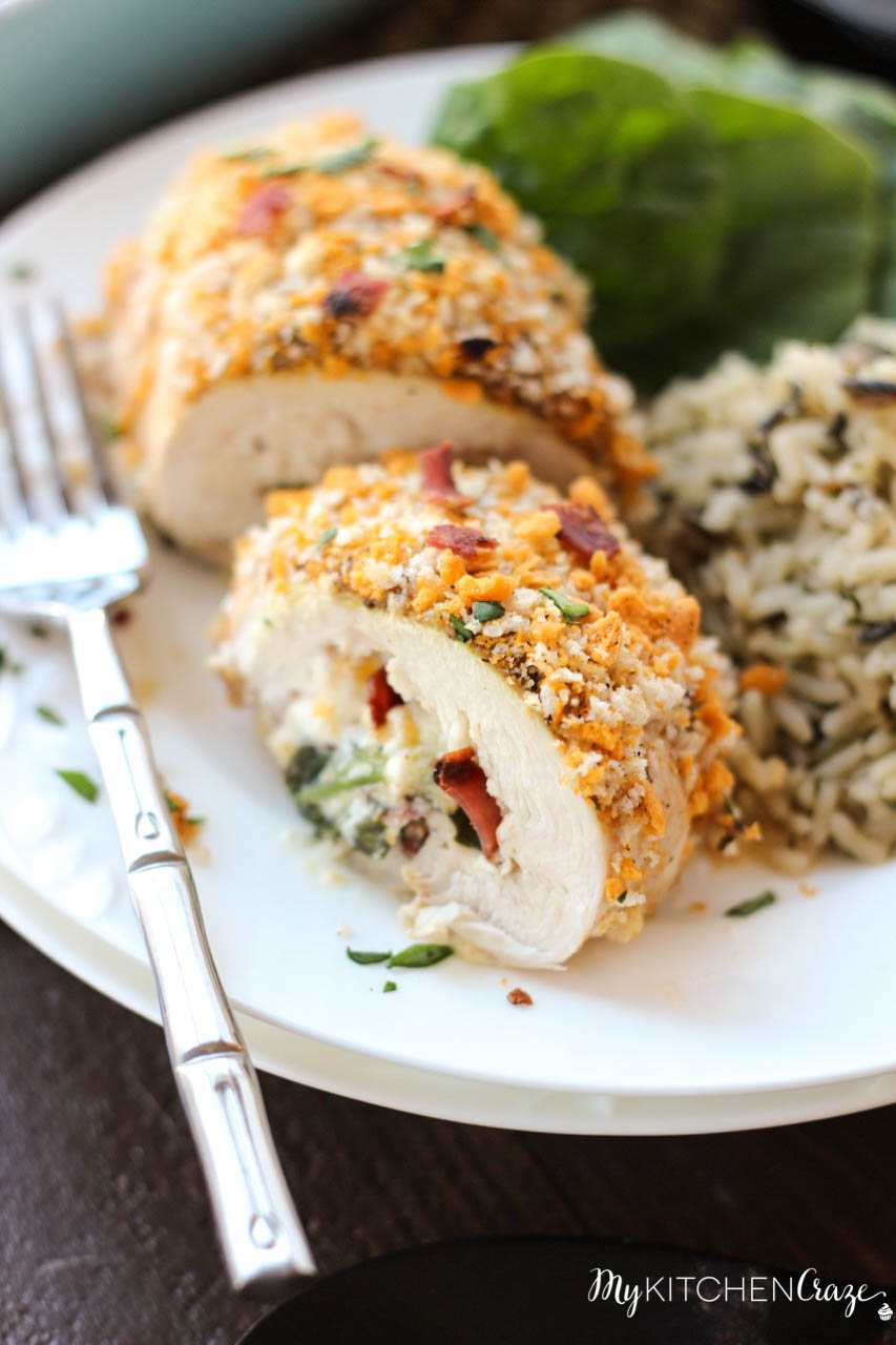 Spinach, Bacon & Cheese Stuffed Chicken ~ mykitchencraze.com ~ This Stuffed Chicken is a savory and delicious meal. Packed with spinach, bacon and cheese then topped with a crunchy topping. This dish is a sure crowd pleaser.