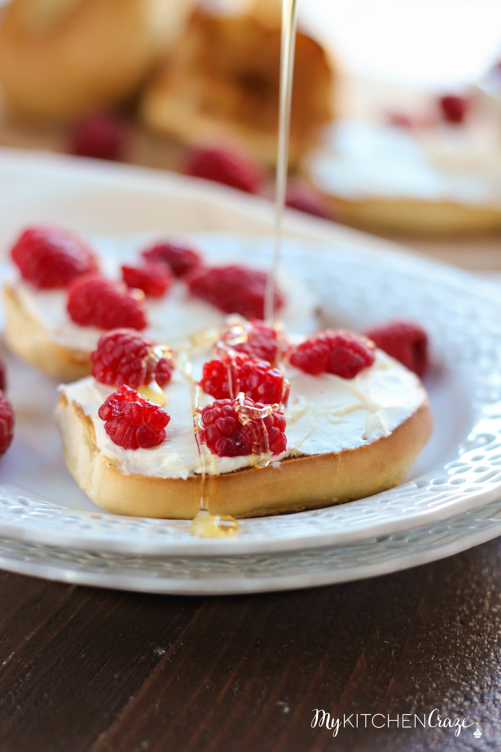 Honey Raspberry Bagels ~ mykitchencraze.com ~ Enjoy these easy 4 ingredient bagels for a quick breakfast or dessert. Loaded with mascarpone cheese, raspberries and honey. These bagels will be gone before you know it.