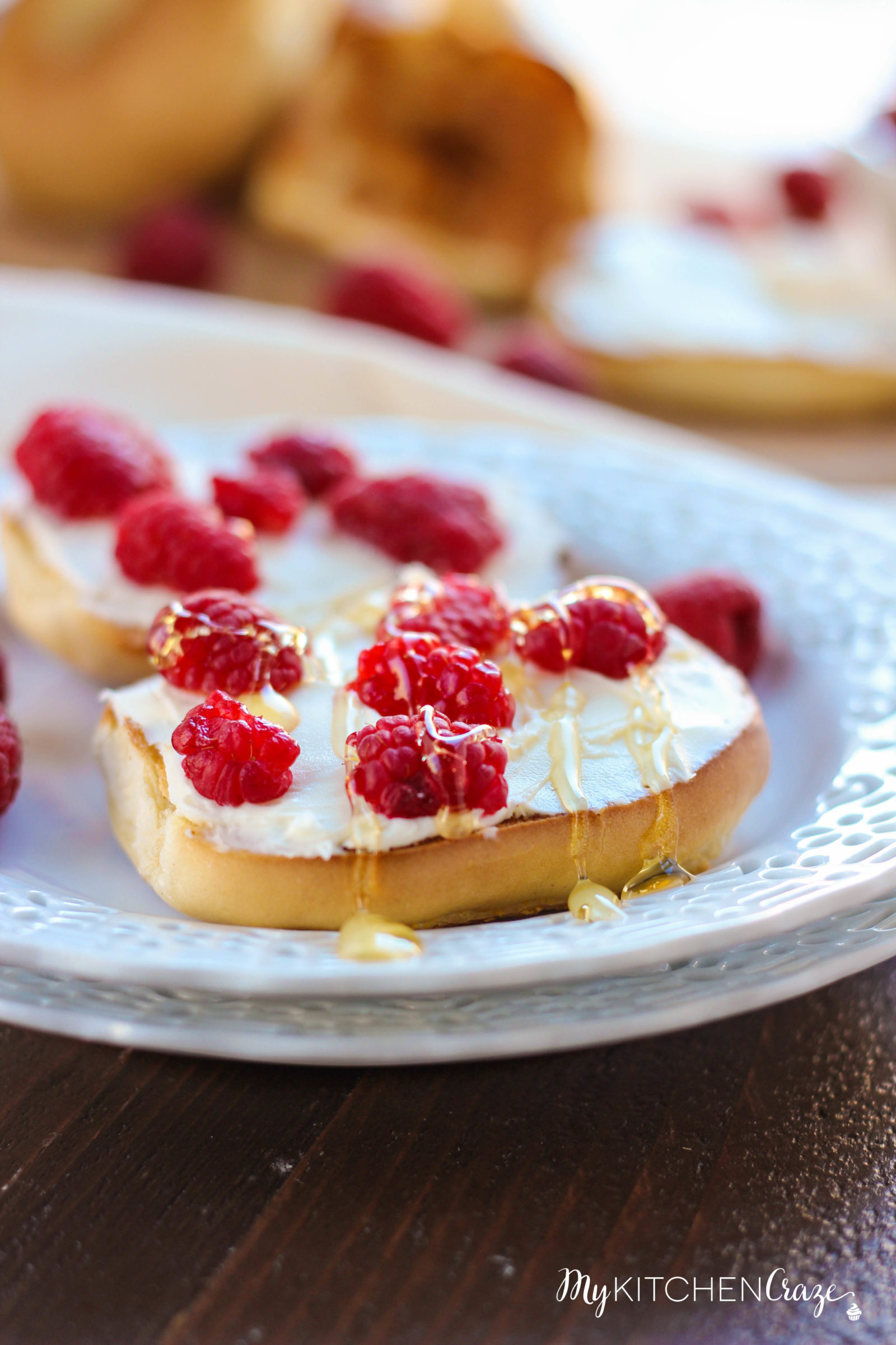 Honey Raspberry Bagels ~ mykitchencraze.com ~ Enjoy these easy 4 ingredient bagels for a quick breakfast or dessert. Loaded with mascarpone cheese, raspberries and honey. These bagels will be gone before you know it.