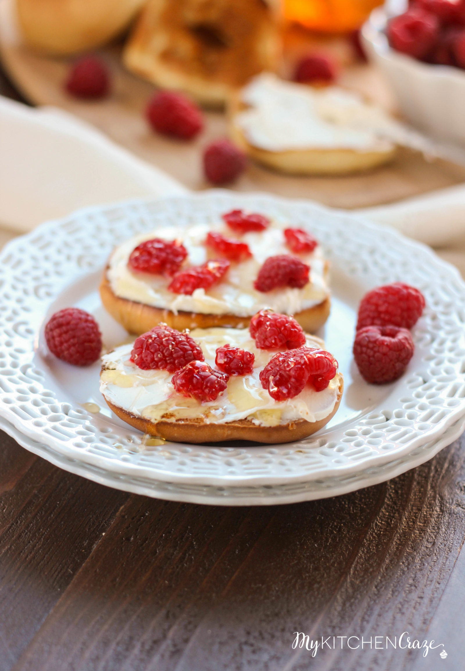 Honey Raspberry Bagels ~ mykitchencraze.com ~ Enjoy these easy 4 ingredient bagels for a quick breakfast or dessert. Loaded with mascarpone cheese, raspberries and honey. These bagels will be gone before you know it.