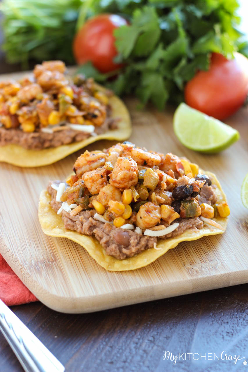 Shrimp Tostadas ~ mykitchencraze.com ~ Enjoy these delicious and scrumptious Shrimp Tostadas in your home. Filled with all sorts of veggies and delicious shrimp. These tostadas will be a winner in your home.