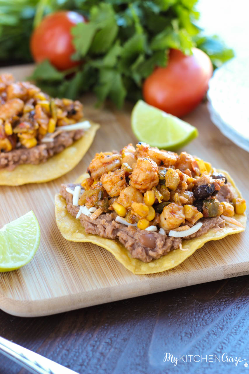 Shrimp Tostadas ~ mykitchencraze.com ~ Enjoy these delicious and scrumptious Shrimp Tostadas in your home. Filled with all sorts of veggies and delicious shrimp. These tostadas will be a winner in your home.