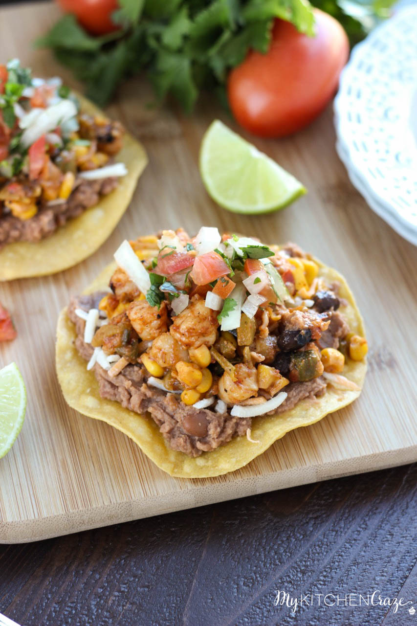 Shrimp Tostadas ~ mykitchencraze.com ~ Enjoy these delicious and scrumptious Shrimp Tostadas in your home. Filled with all sorts of veggies and delicious shrimp. These tostadas will be a winner in your home.