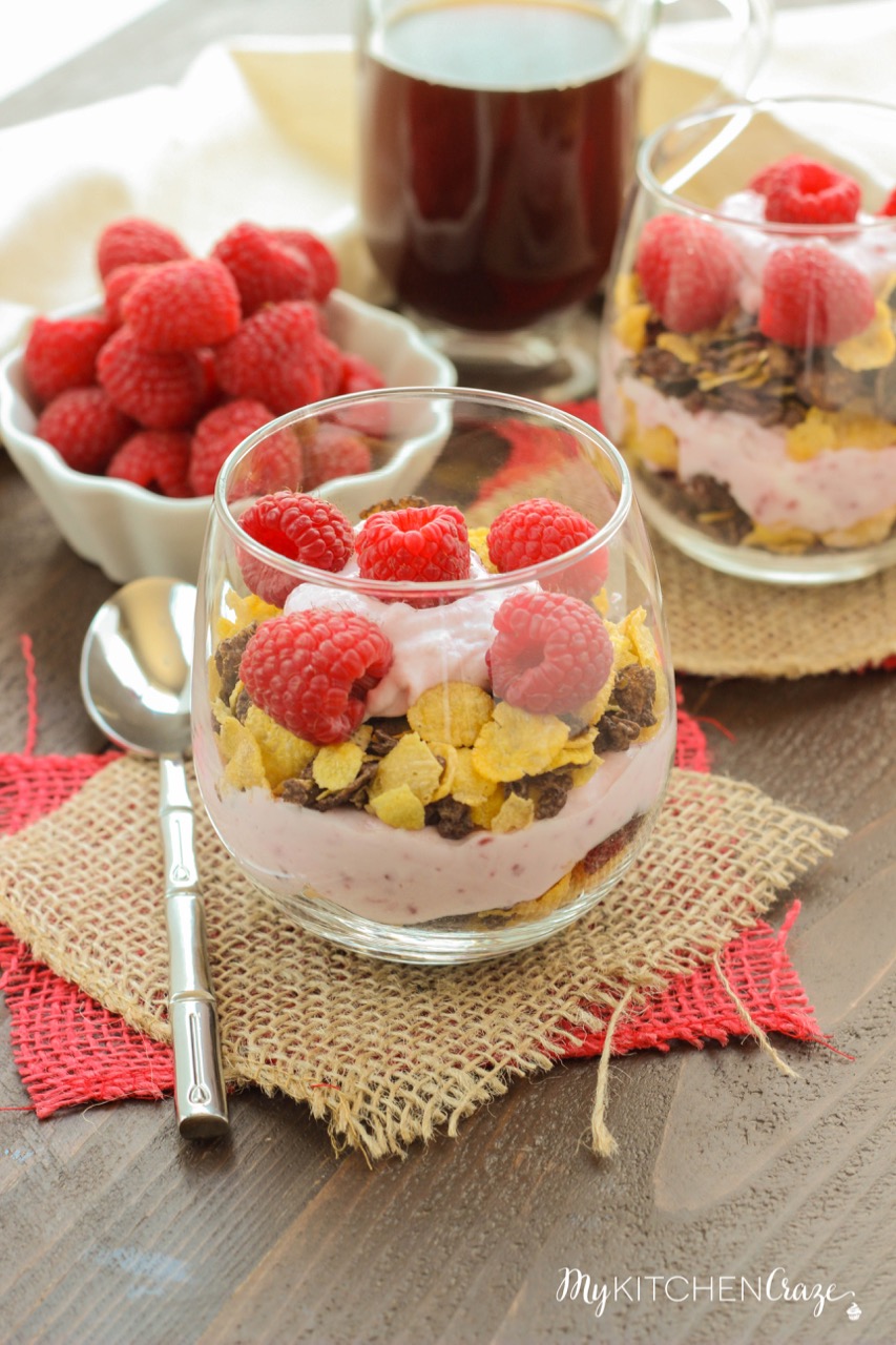 Raspberry Chocolate Crunch Parfaits ~ mykitchencraze.com ~ A delicious breakfast for those busy mornings. Greek yogurt layered with Honey Bunches of Oats Chocolate cereal and topped with fresh raspberries. Perfect combo!