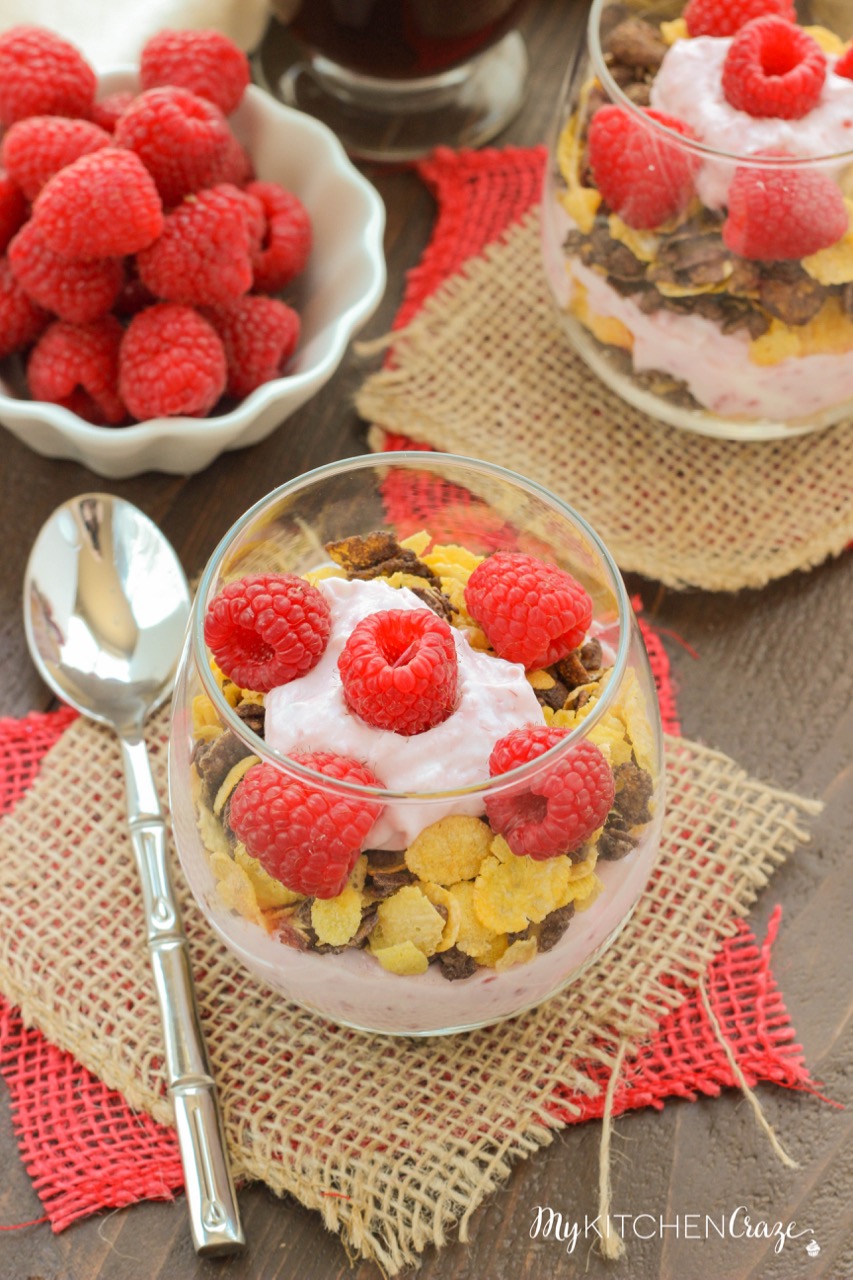 Raspberry Chocolate Crunch Parfaits ~ mykitchencraze.com ~ A delicious breakfast for those busy mornings. Greek yogurt layered with Honey Bunches of Oats Chocolate cereal and topped with fresh raspberries. Perfect combo!