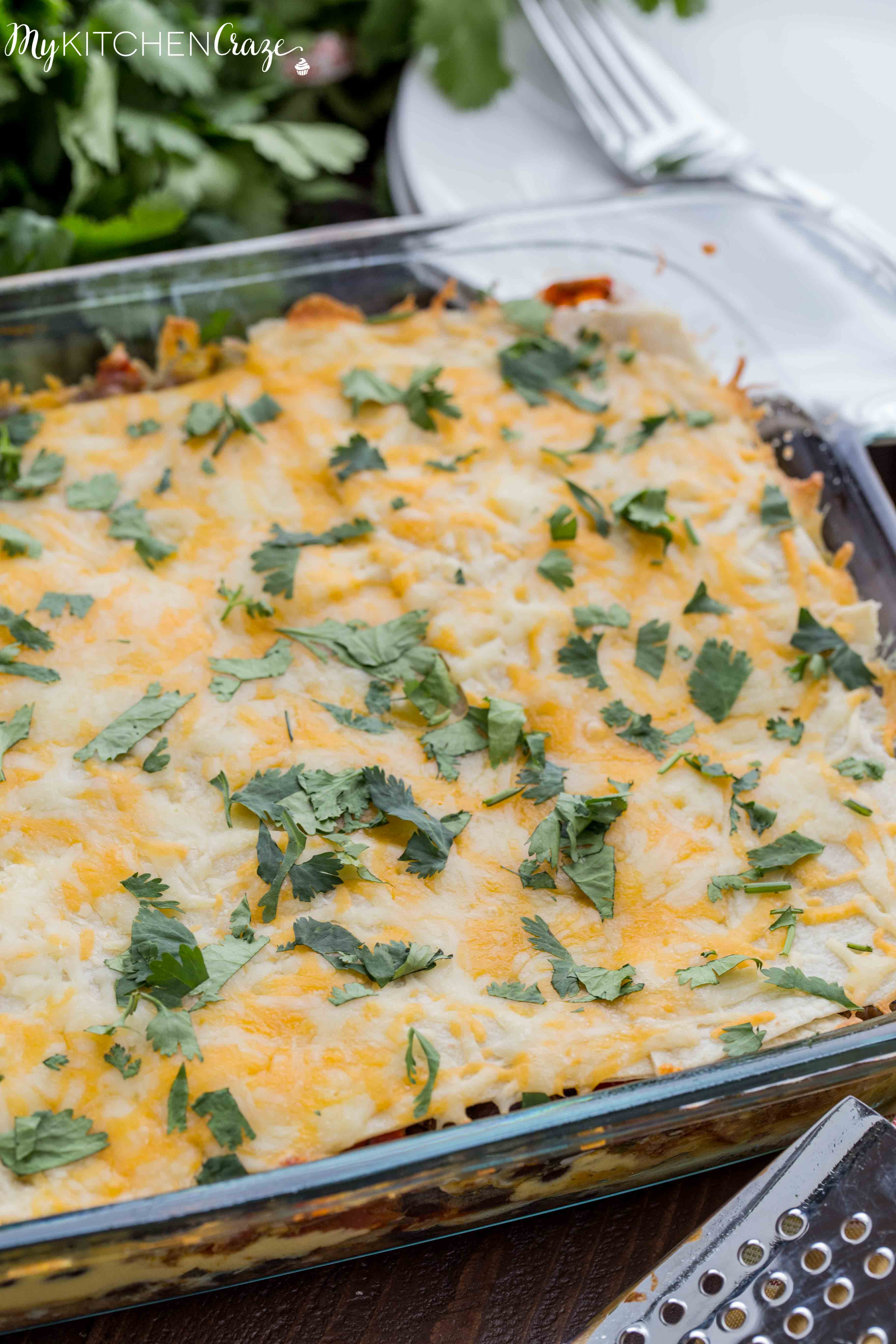 Cheesy Burrito Casserole ~ mykitchencraze.com ~ Enjoy this 30 minute meal on those busy nights. Loaded with all sorts of veggies, ground beef and a delicious sauce. You won't have any leftovers!