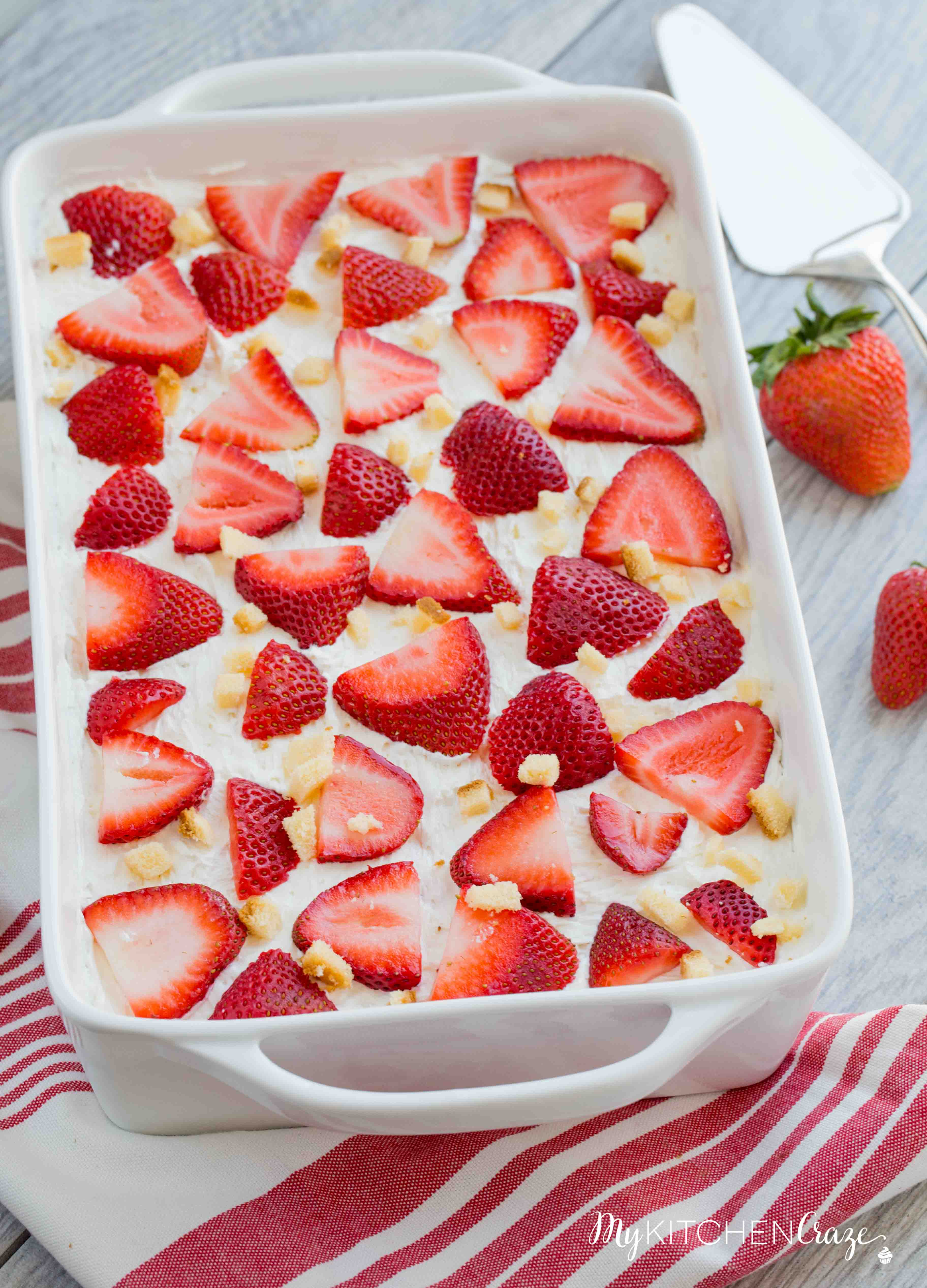 Strawberry Tiramisu ~ mykitchencraze.com ~ Enjoy this delicious and fun twist on tiramisu! Loaded with strawberries, pound cake, mascarpone cheese and cool whip. This is one dessert you won't be able to pass up!