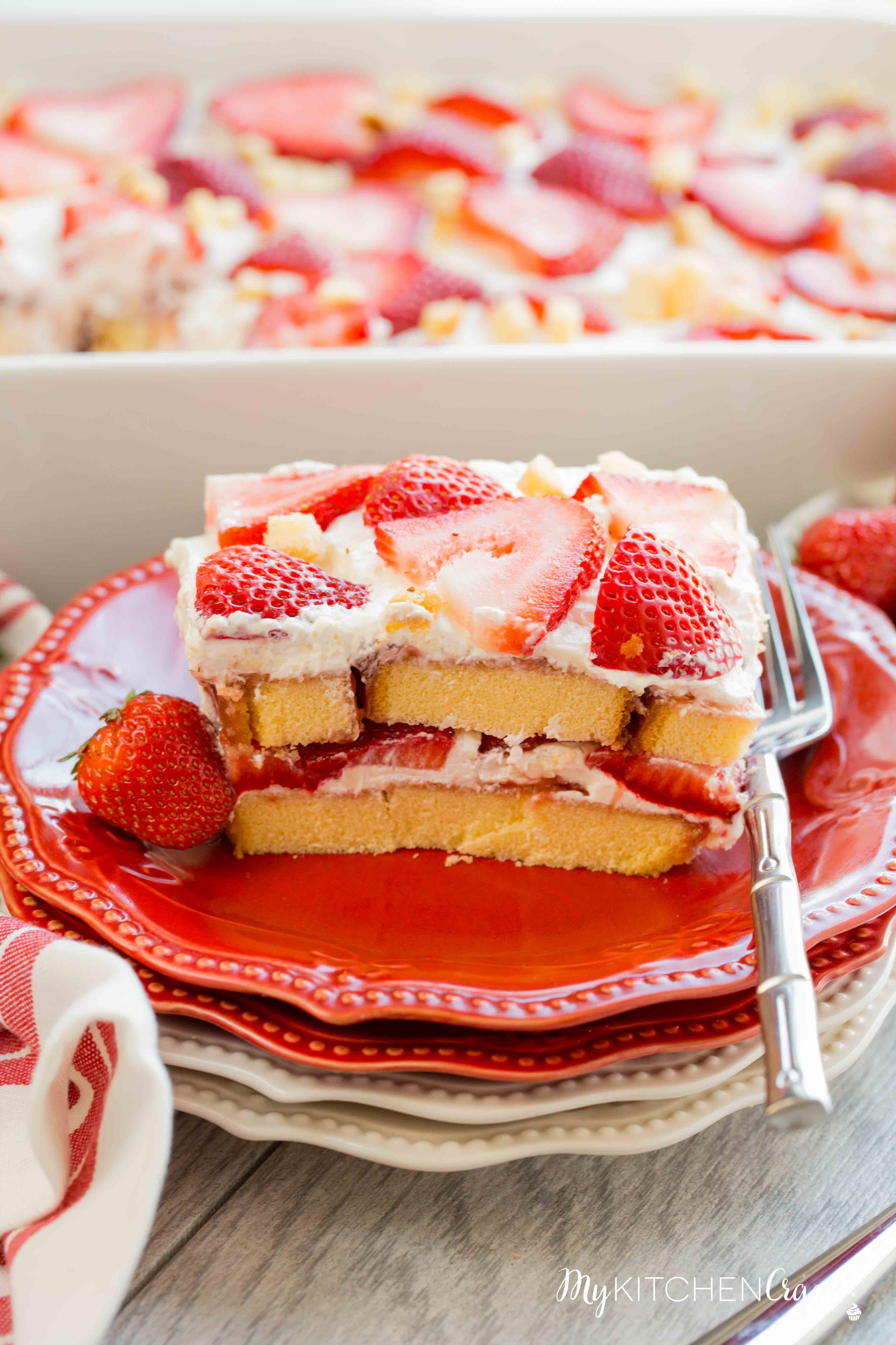 Strawberry Tiramisu ~ mykitchencraze.com ~ Enjoy this delicious and fun twist on tiramisu! Loaded with strawberries, pound cake, mascarpone cheese and cool whip. This is one dessert you won't be able to pass up!