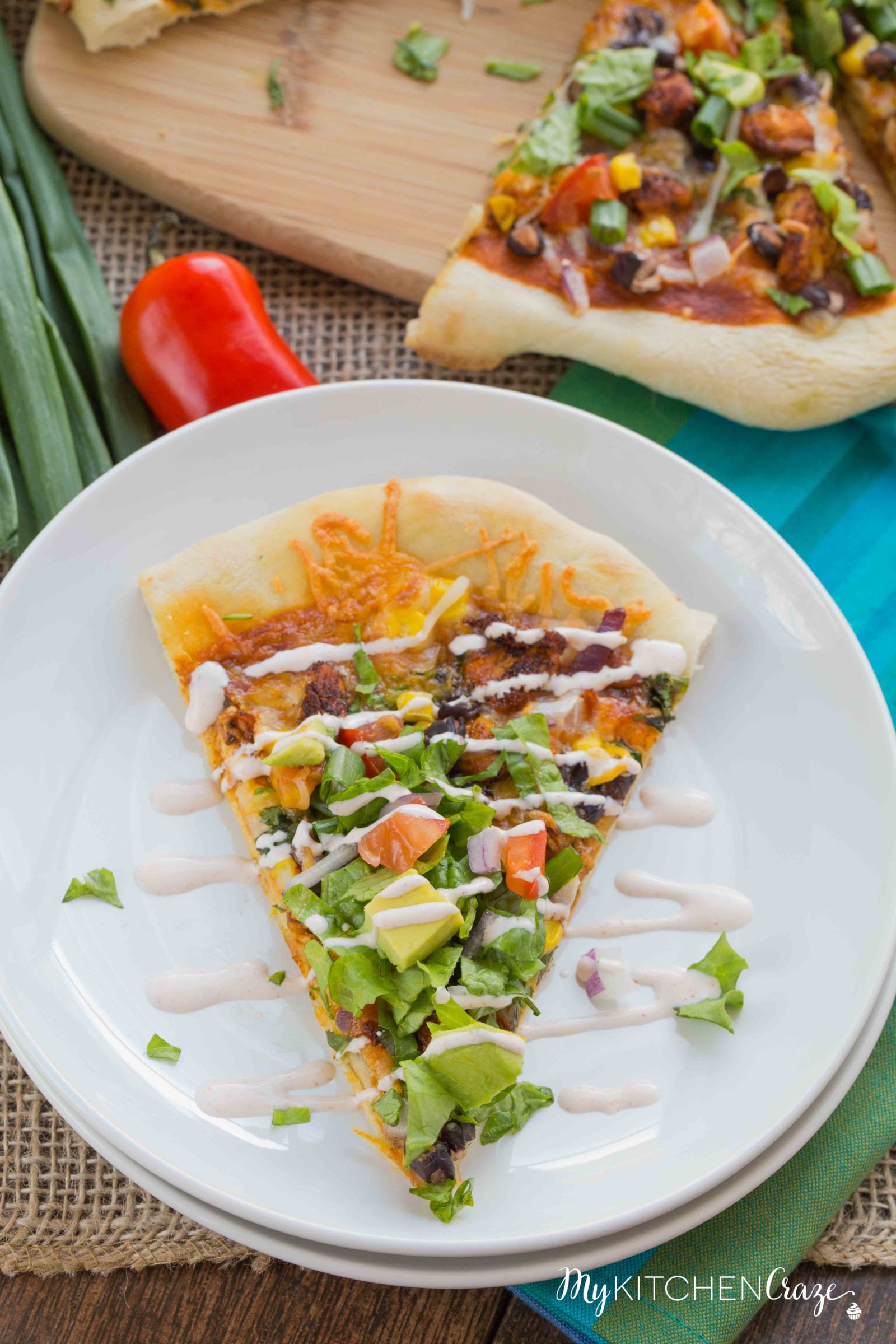 Chicken Taco Pizza ~ mykitchencraze.com ~ A fun twist on pizza night and all done within 30 minutes. Perfect family dinner recipe!