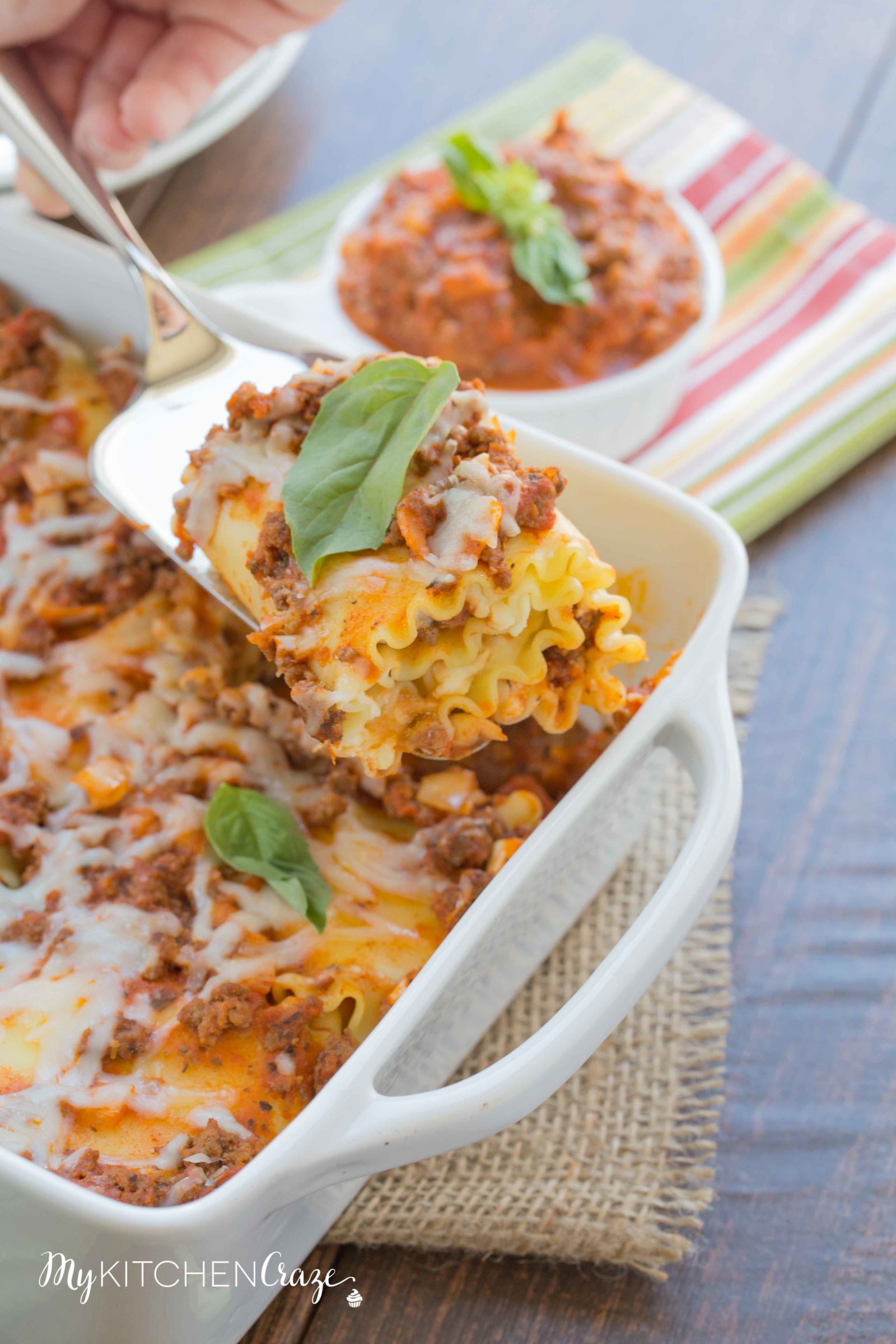Lasagna Roll-Ups ~ mykitchencraze.com ~ A fun twist and easy way to make lasagna. These roll-ups are filled with everything you'd put in your lasagna, but better. The family will love them!