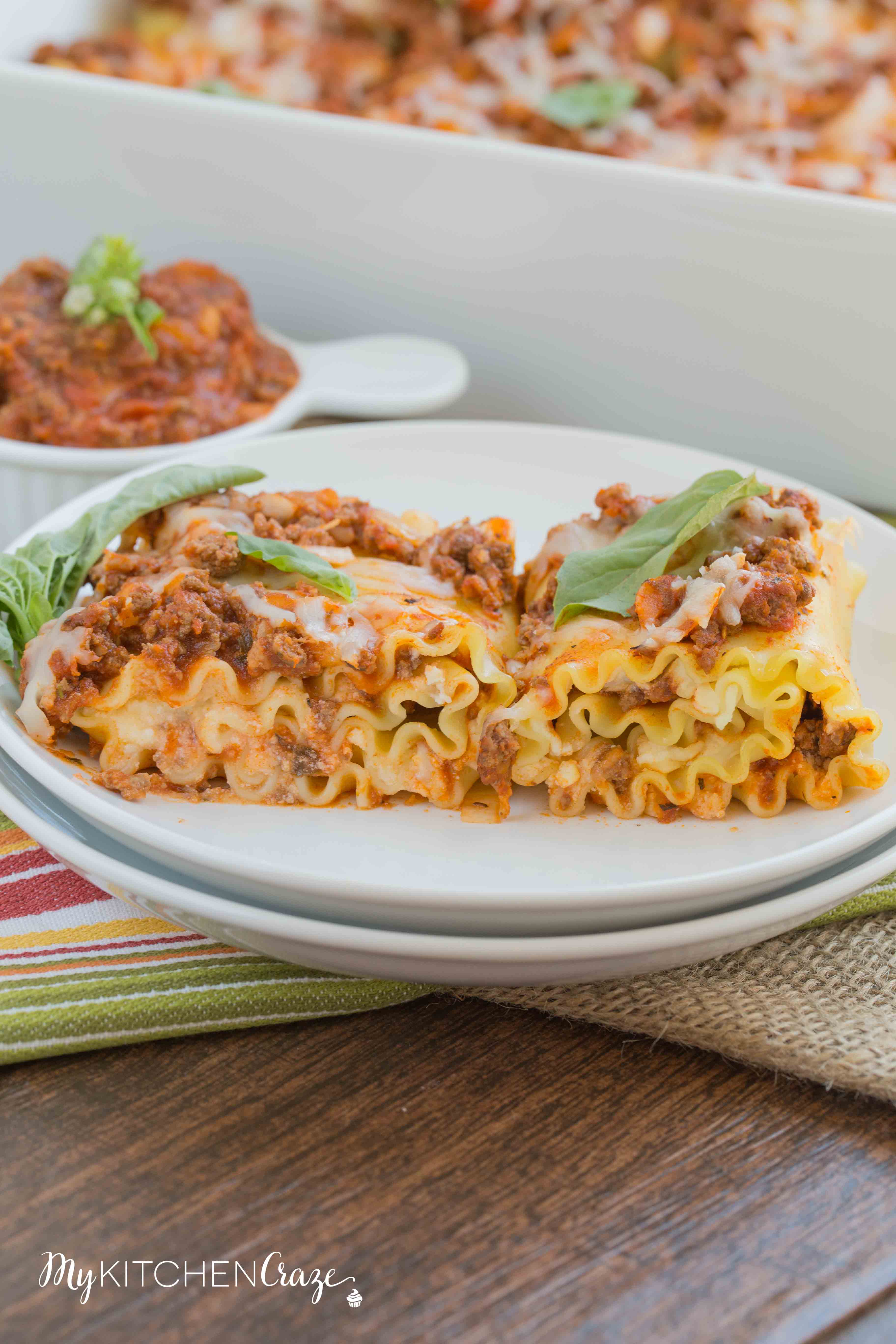 Lasagna Roll-Ups ~ mykitchencraze.com ~ A fun twist and easy way to make lasagna. These roll-ups are filled with everything you'd put in your lasagna, but better. The family will love them!