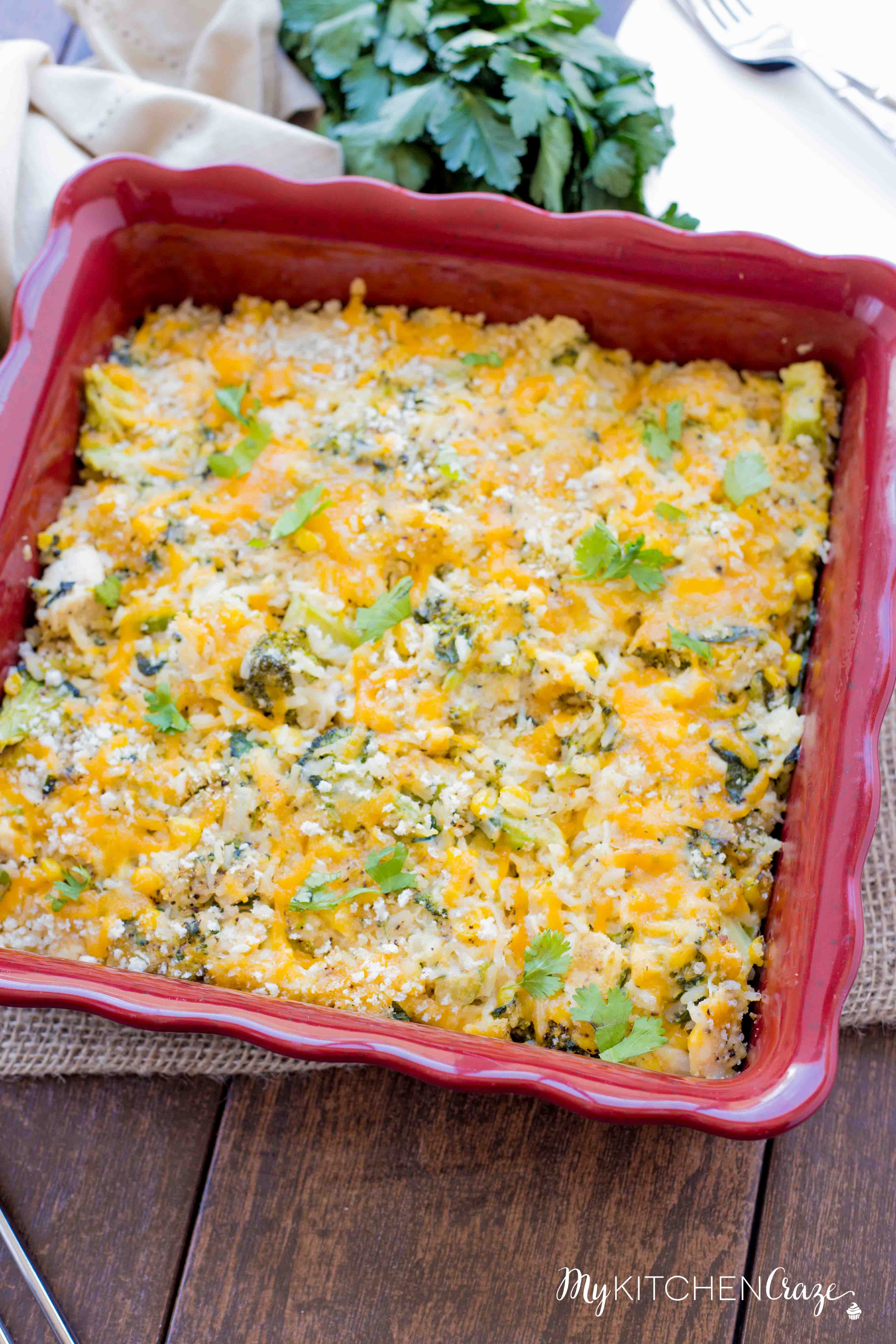 Cheesy Chicken and Vegetable Rice Casserole ~ Loaded with all sorts of delicious ingredients and flavors and the leftovers are even better the next day. Perfect for those busy nights!