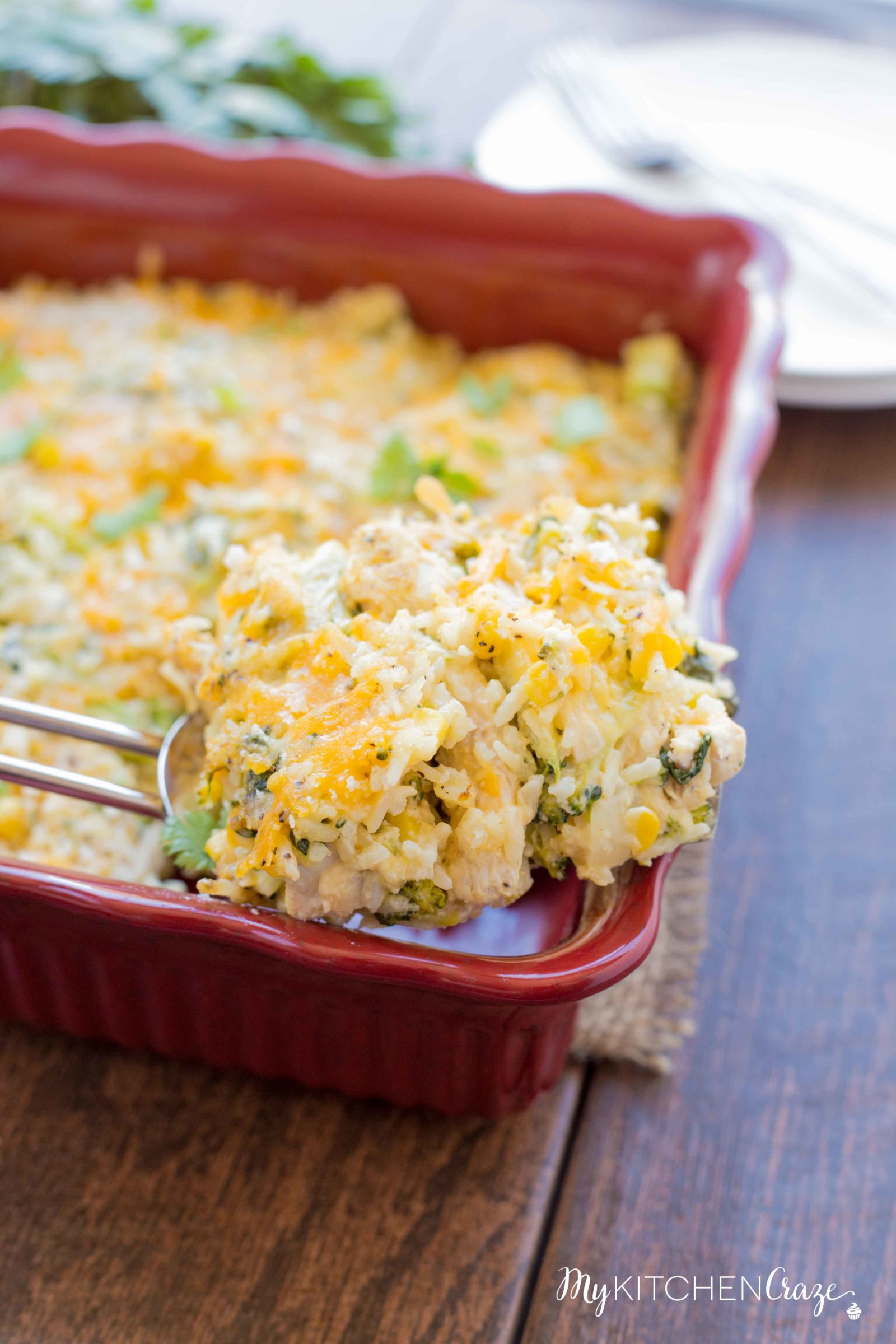 Cheesy Chicken and Vegetable Rice Casserole ~ Loaded with all sorts of delicious ingredients and flavors and the leftovers are even better the next day. Perfect for those busy nights!