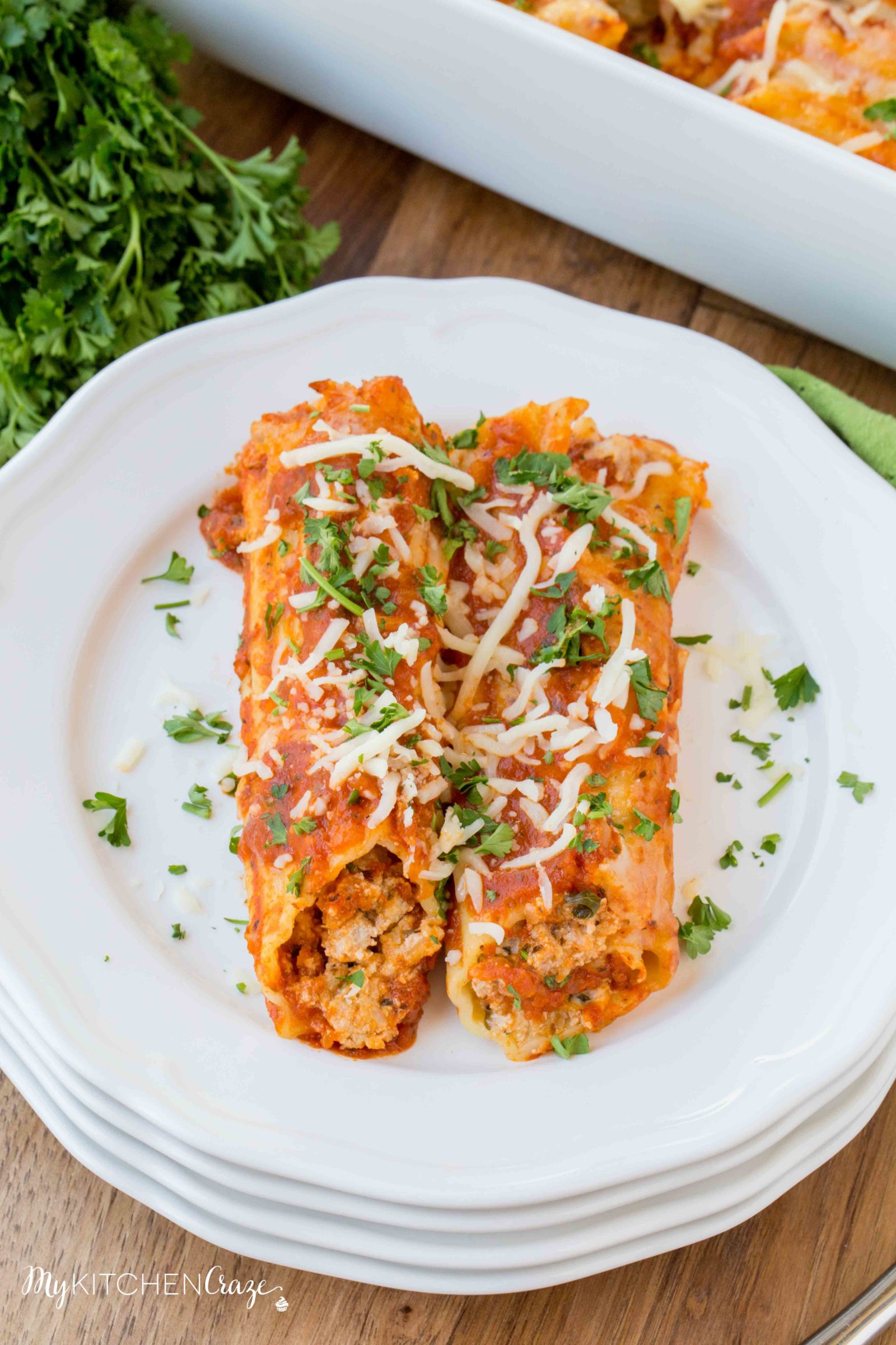 Homemade Manicotti ~ mykitchencraze.com ~ Enjoy this delicious homemade manicotti right at your own dinner table. It’s a perfect recipe for a potluck or family gathering.