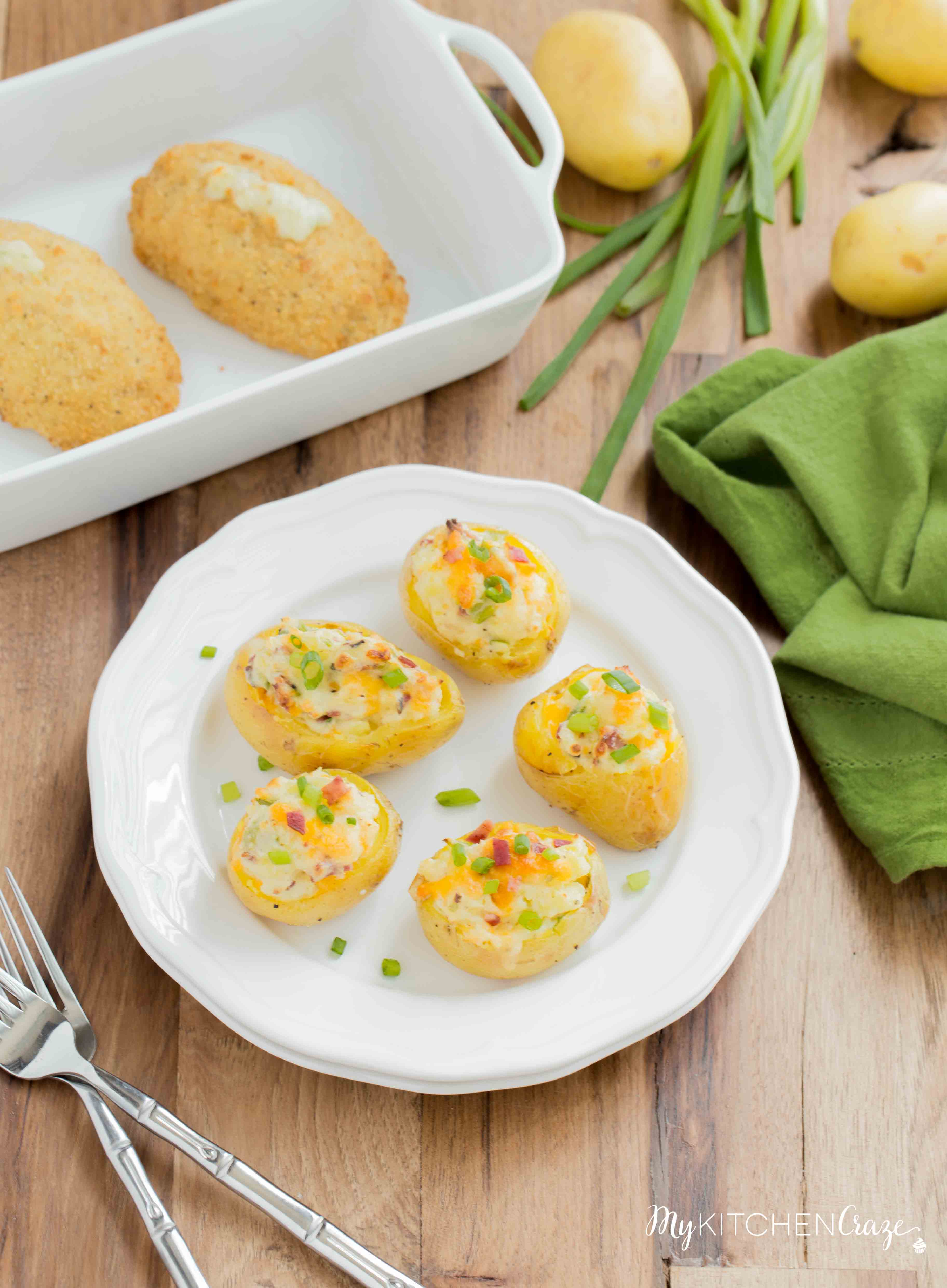 Mini Twice Baked Potatoes ~ Potatoes baked to perfection then loaded with bacon, green onions and cheese. All the yummy things you need for a side! These mini twice baked potatoes are the perfect side.