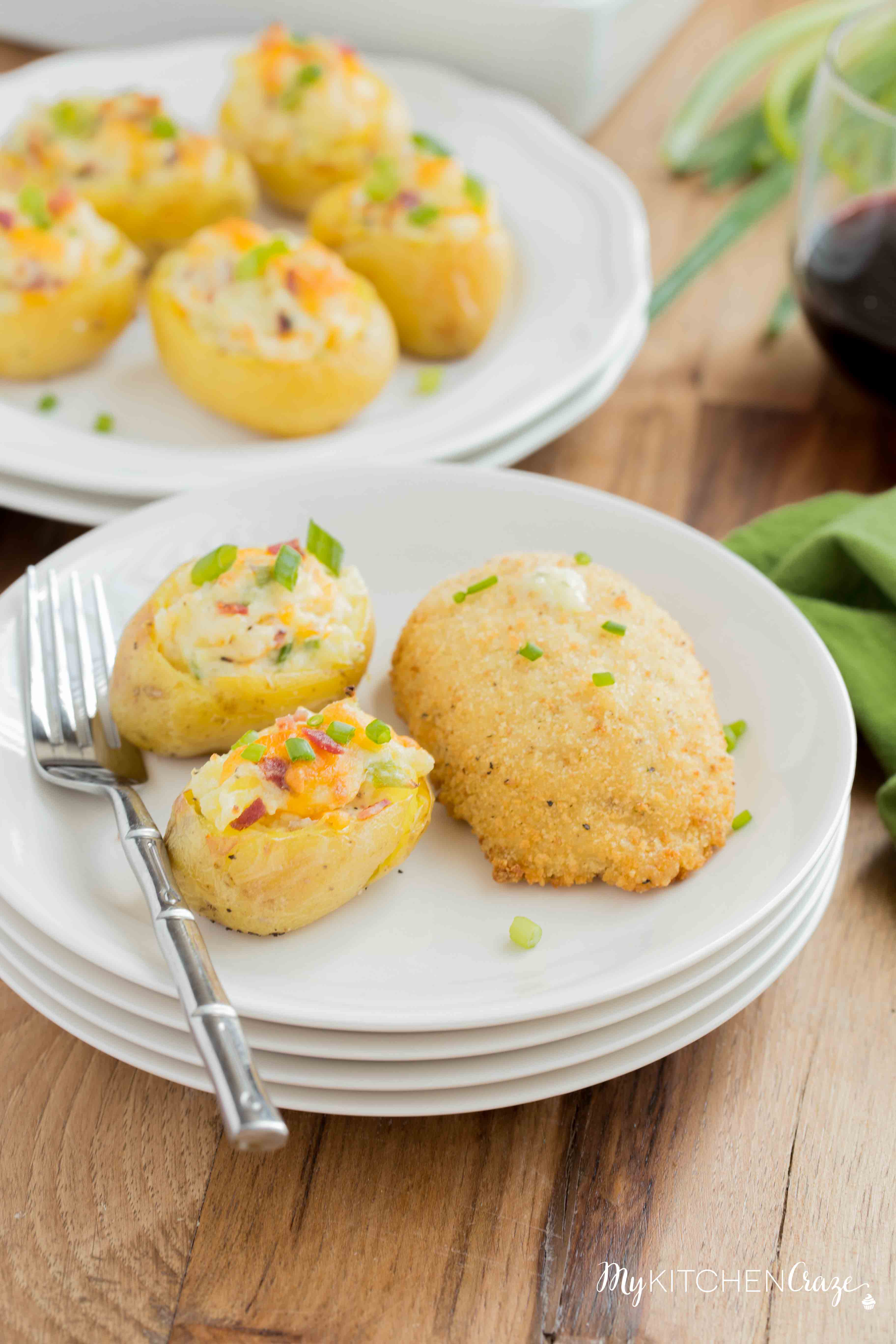 Mini Twice Baked Potatoes ~ Potatoes baked to perfection then loaded with bacon, green onions and cheese. All the yummy things you need for a side! These mini twice baked potatoes are the perfect side.