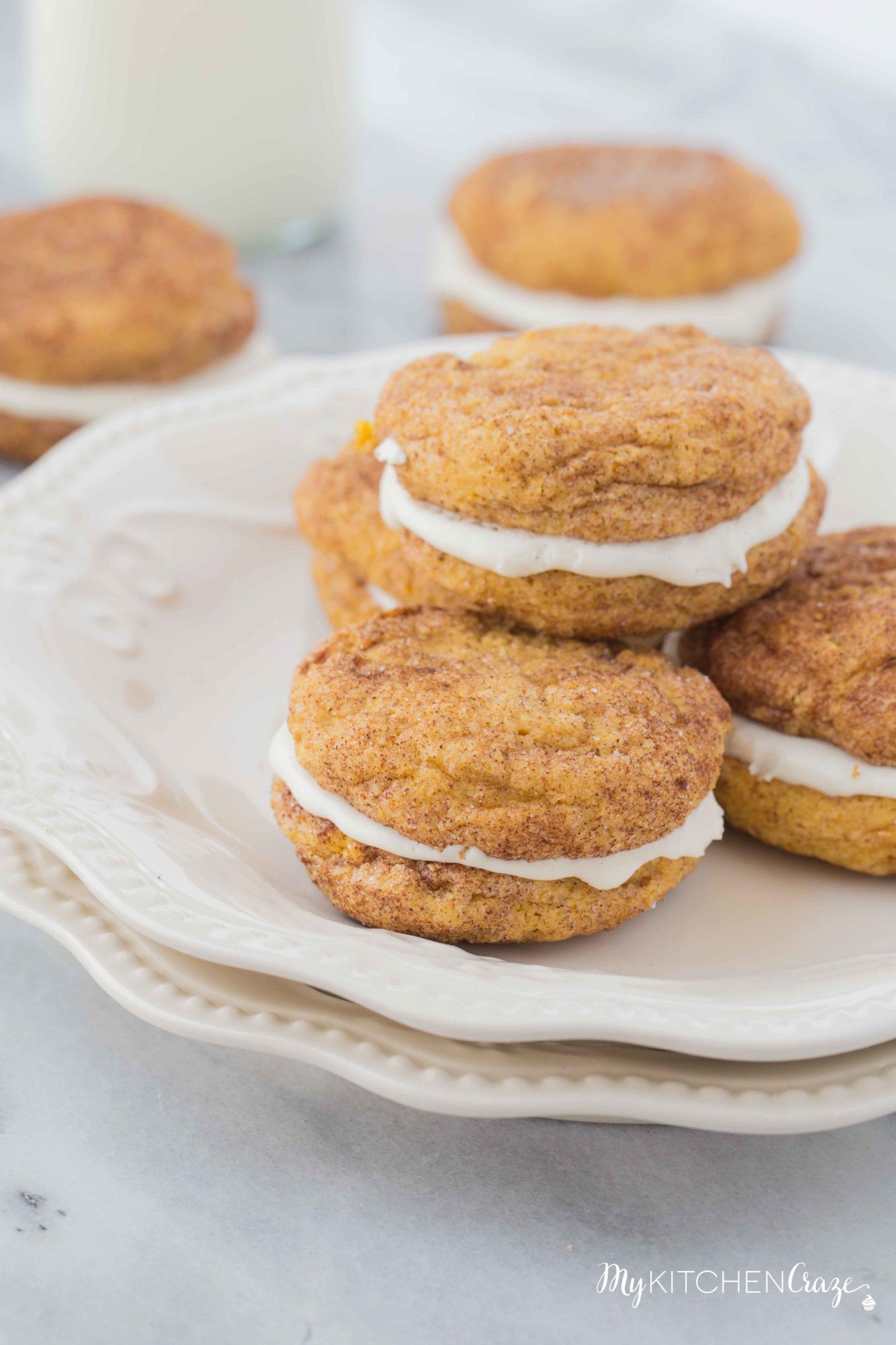 Pumpkin Snickerdoodle Whoopie Pies ~ Moist, delicious cookies filled with marshmallow cream! Perfect for this Fall season!
