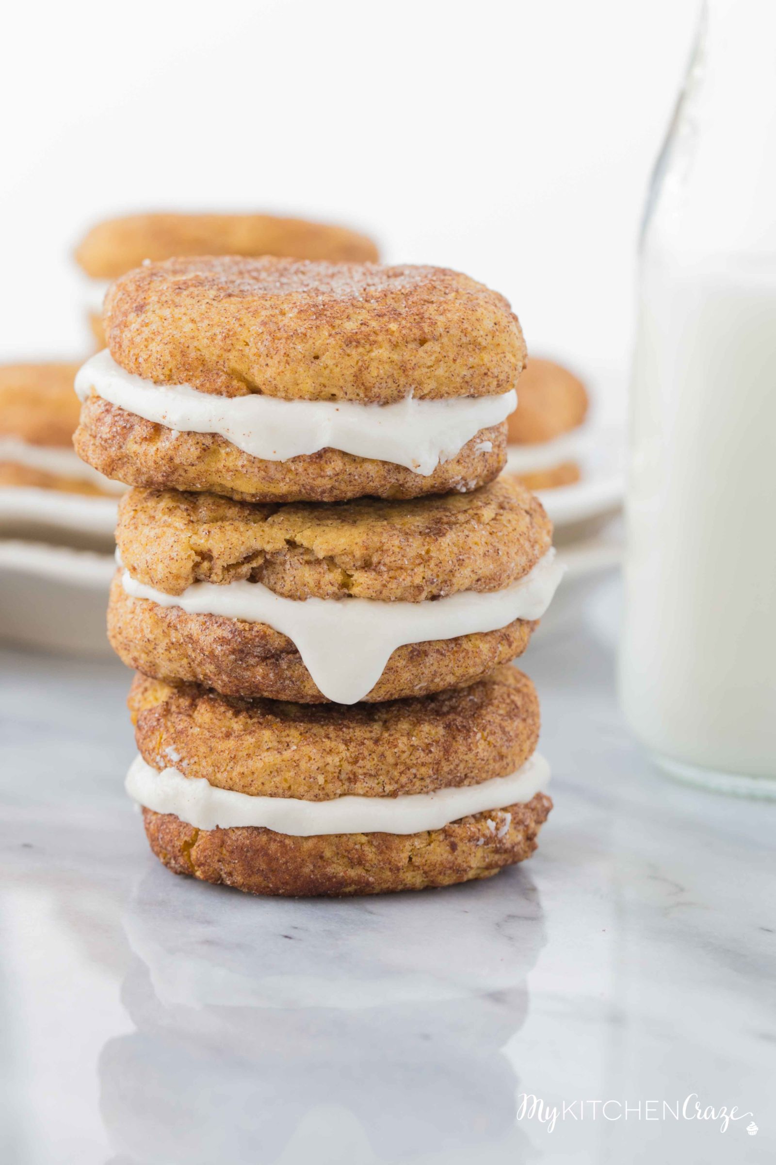 Pumpkin Snickerdoodle Whoopie Pies ~ Moist, delicious cookies filled with marshmallow cream! Perfect for this Fall season!