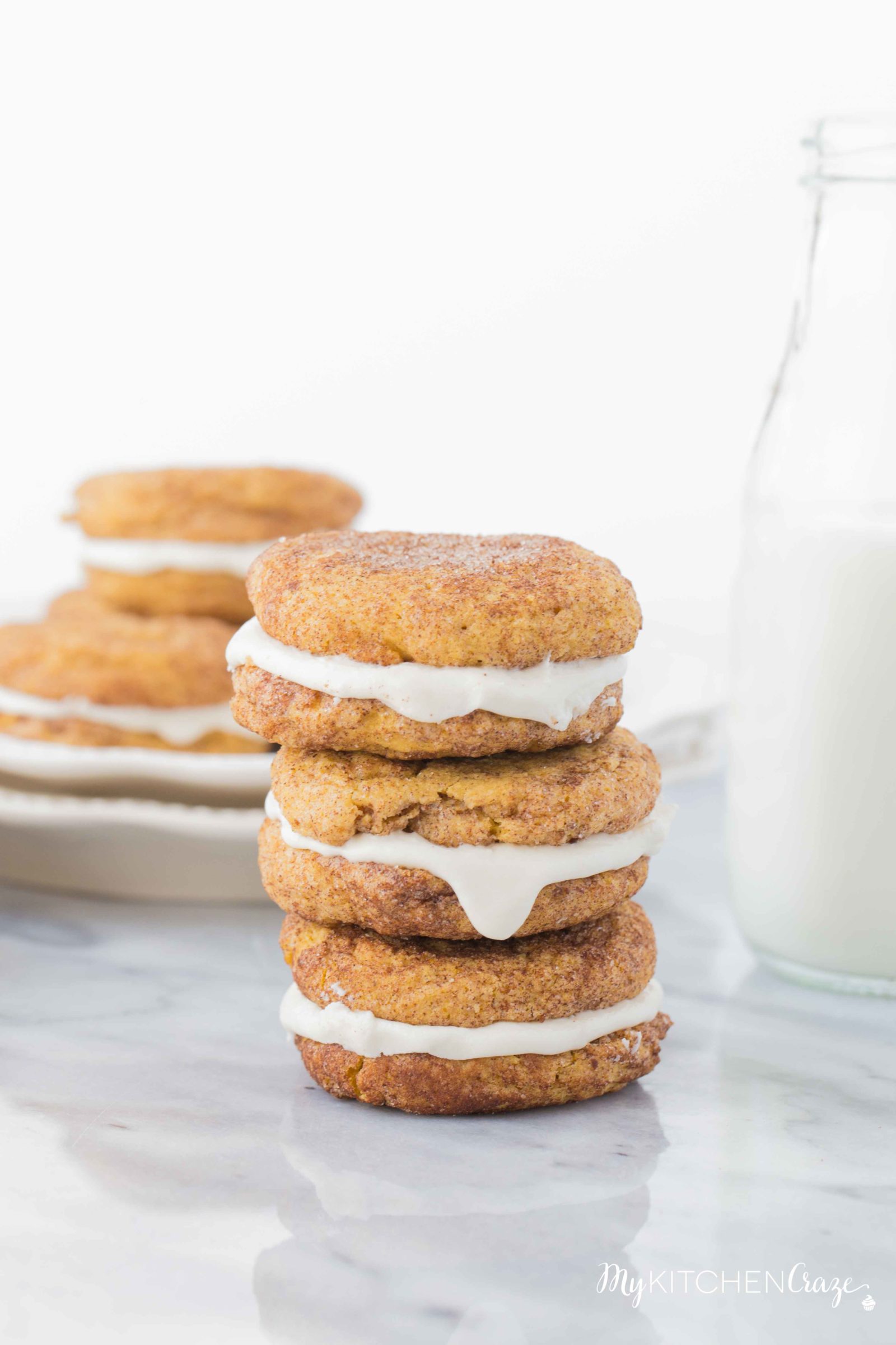Pumpkin Snickerdoodle Whoopie Pies ~ Moist, delicious cookies filled with marshmallow cream! Perfect for this Fall season!