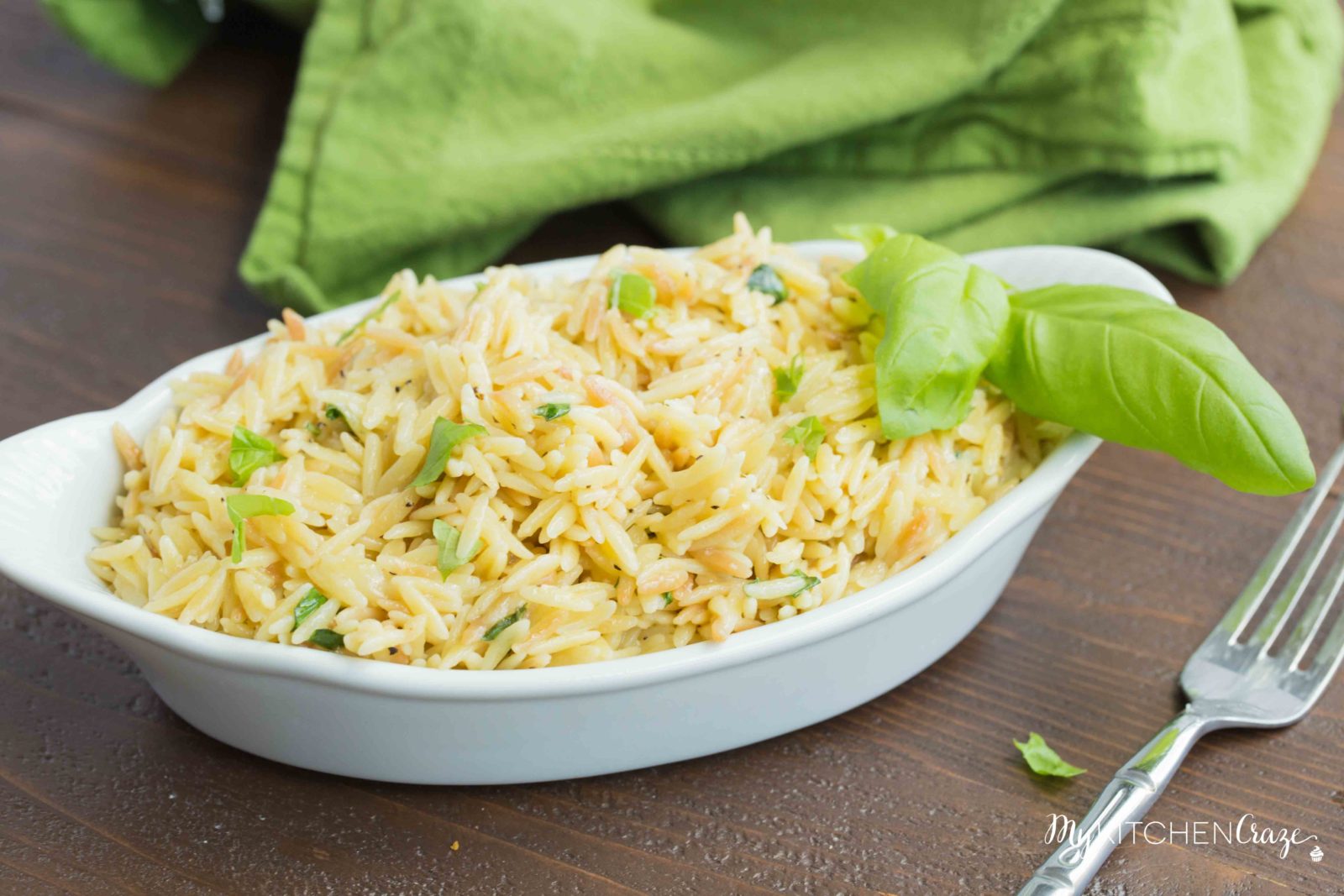 Cheesy Basil Orzo ~ Only 6 ingredients are all you need to make this fresh pasta side recipe. The cheese and basil brighten the dish making it perfect for any main.