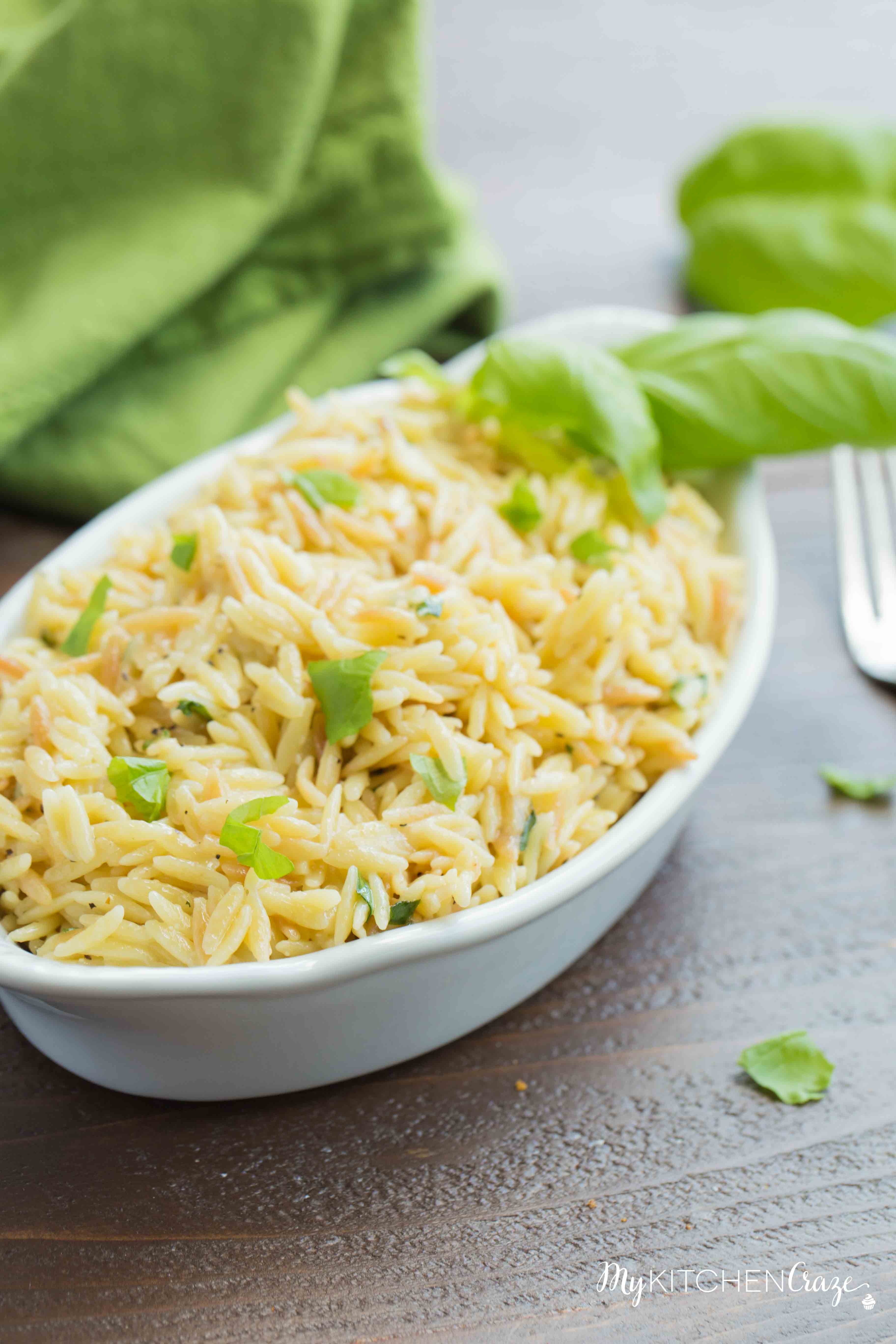 Cheesy Basil Orzo ~ Only 6 ingredients are all you need to make this fresh pasta side recipe. The cheese and basil brighten the dish making it perfect for any main.