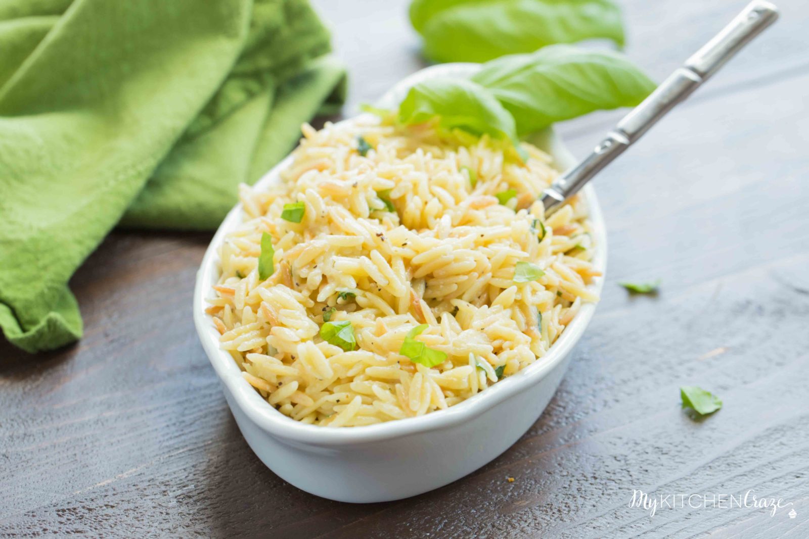 Cheesy Basil Orzo ~ Only 6 ingredients are all you need to make this fresh pasta side recipe. The cheese and basil brighten the dish making it perfect for any main.