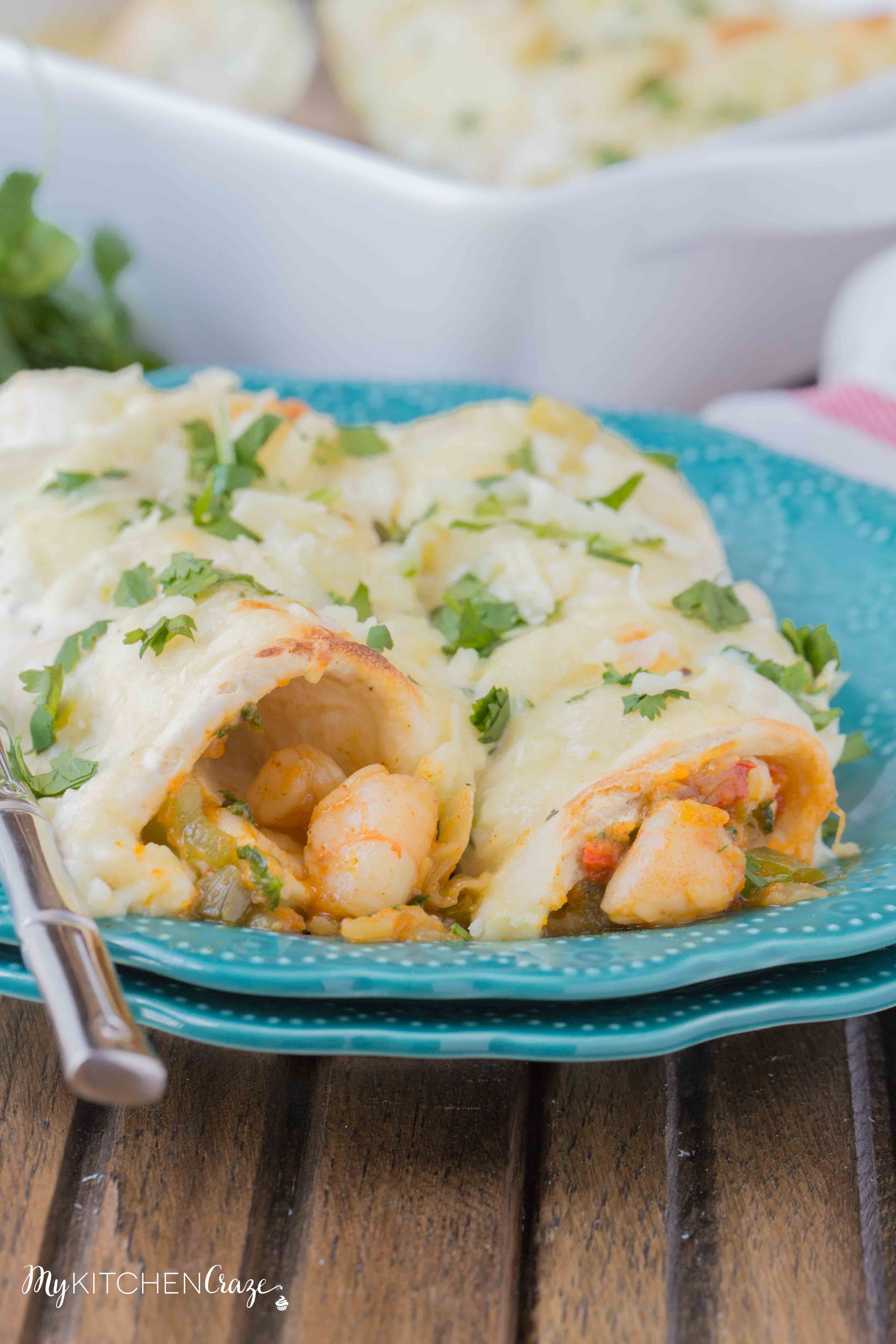 Shrimp Enchiladas ~ Filled with tender, flavorful shrimp then topped with a delicious homemade creamy sauce. You're going to love these enchiladas!