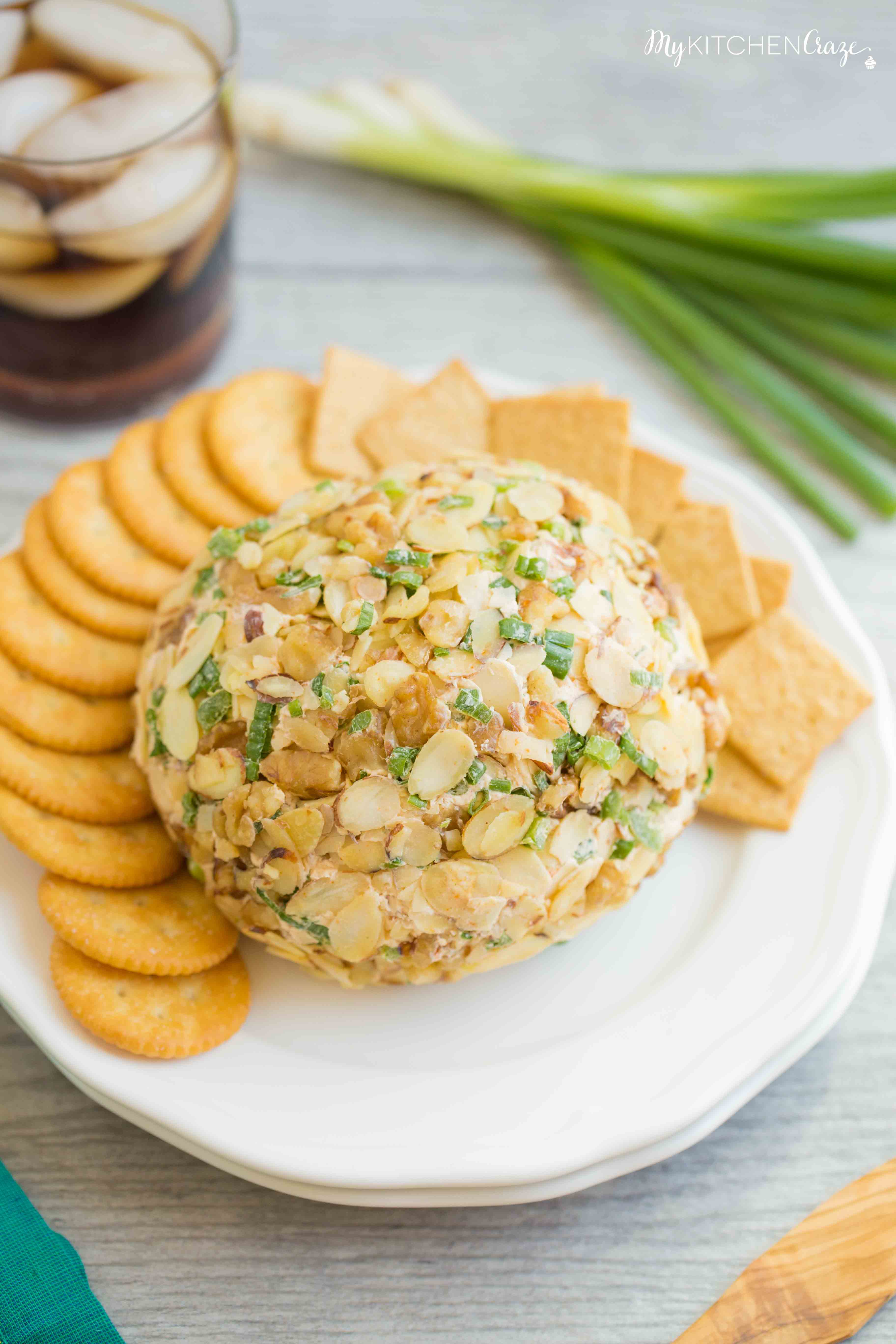 Spicy Cheese Ball ~ Loaded with cream cheese, spices, jalapeños, shredded cheeses & fresh veggies. This is one cheese ball bundled with rich creamy goodness!