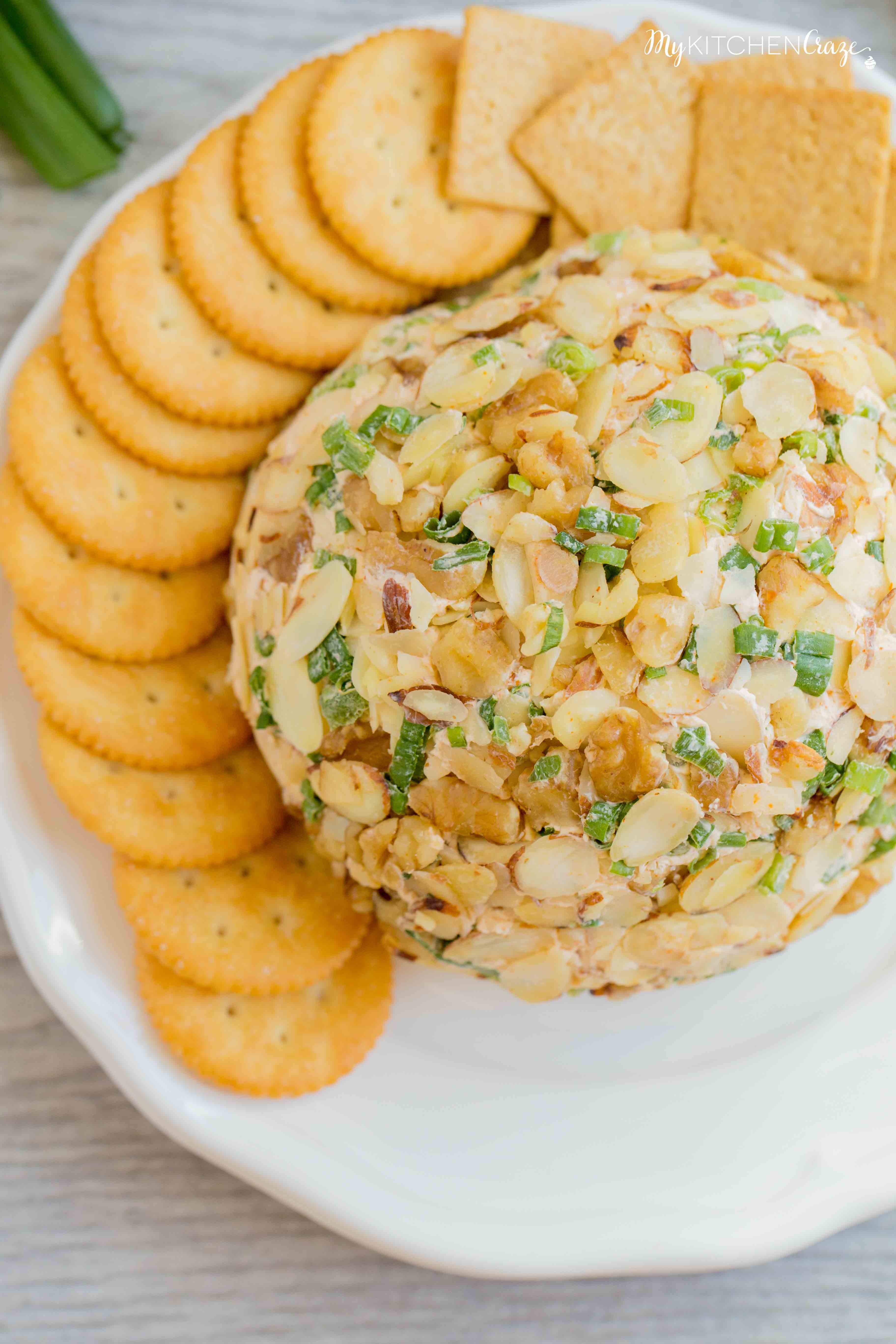 Spicy Cheese Ball ~ Loaded with cream cheese, spices, jalapeños, shredded cheeses & fresh veggies. This is one cheese ball bundled with rich creamy goodness!