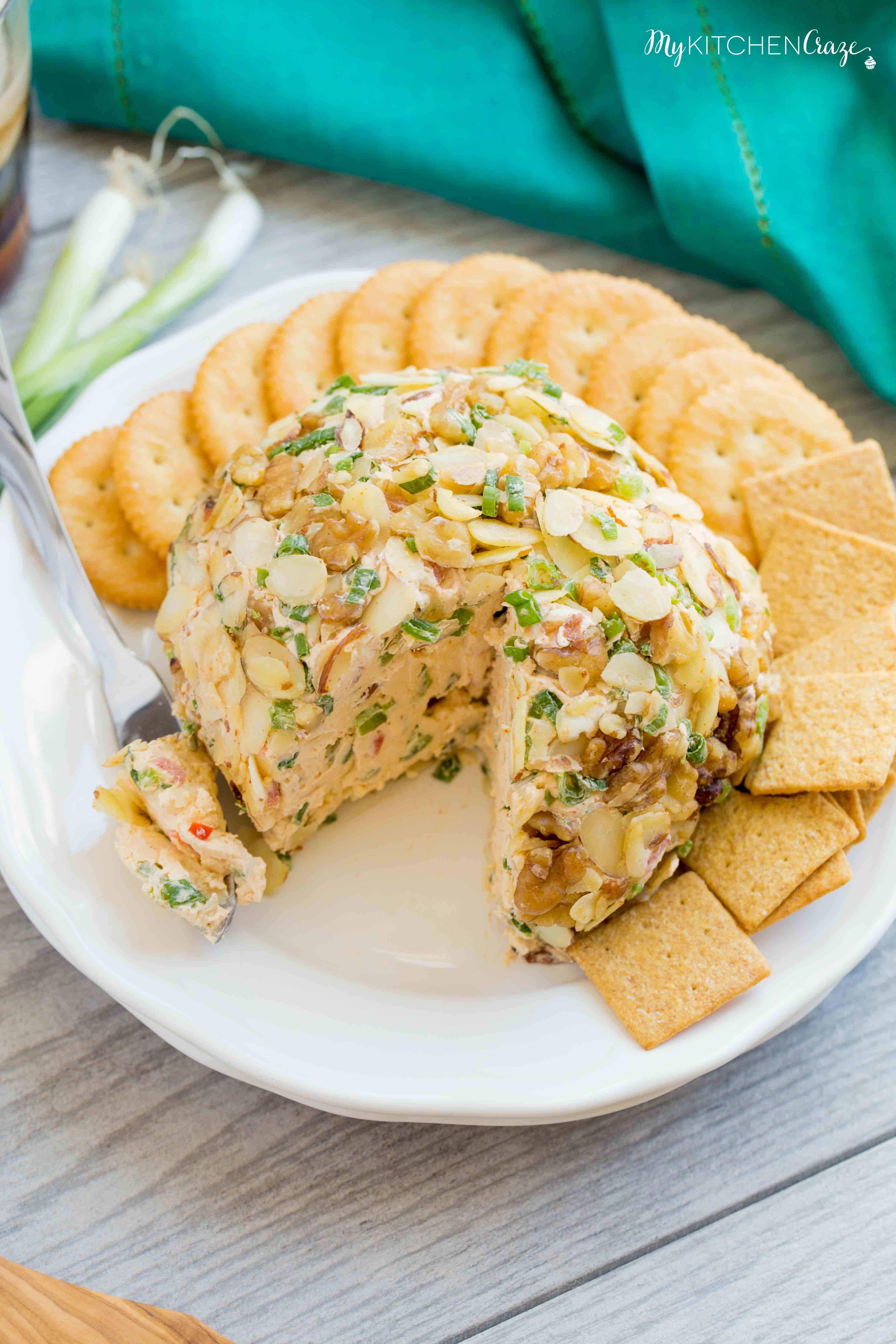 Spicy Cheese Ball ~ Loaded with cream cheese, spices, jalapeños, shredded cheeses & fresh veggies. This is one cheese ball bundled with rich creamy goodness!