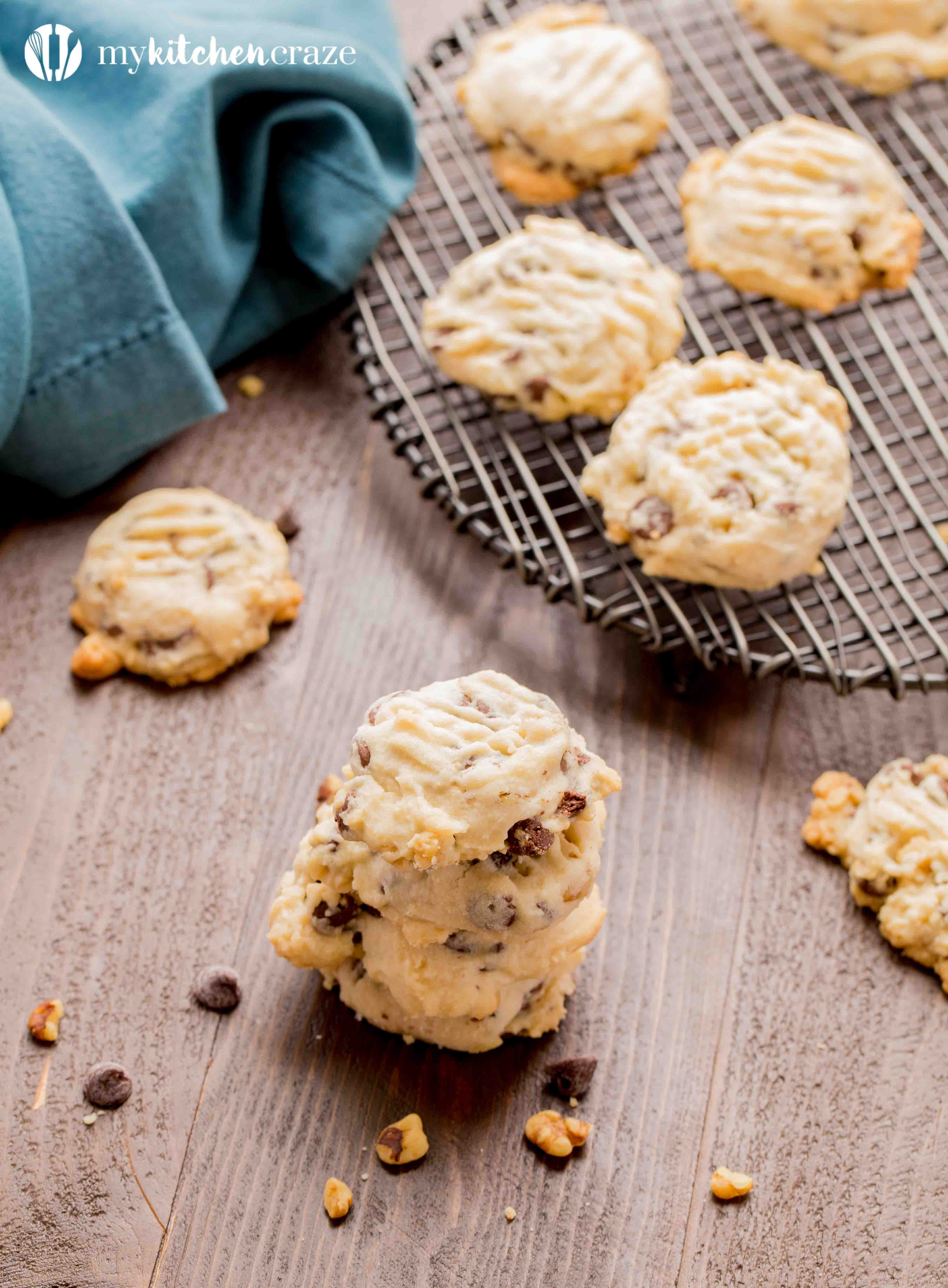 Chocolate Chip Tea Cake Cookies ~ Grab a cup of coffee, your favorite movie and some of these Chocolate Chip Tea Cake Cookies!! They're flakey with the perfect hint of pecans & chocolate chips. You're going to love them!