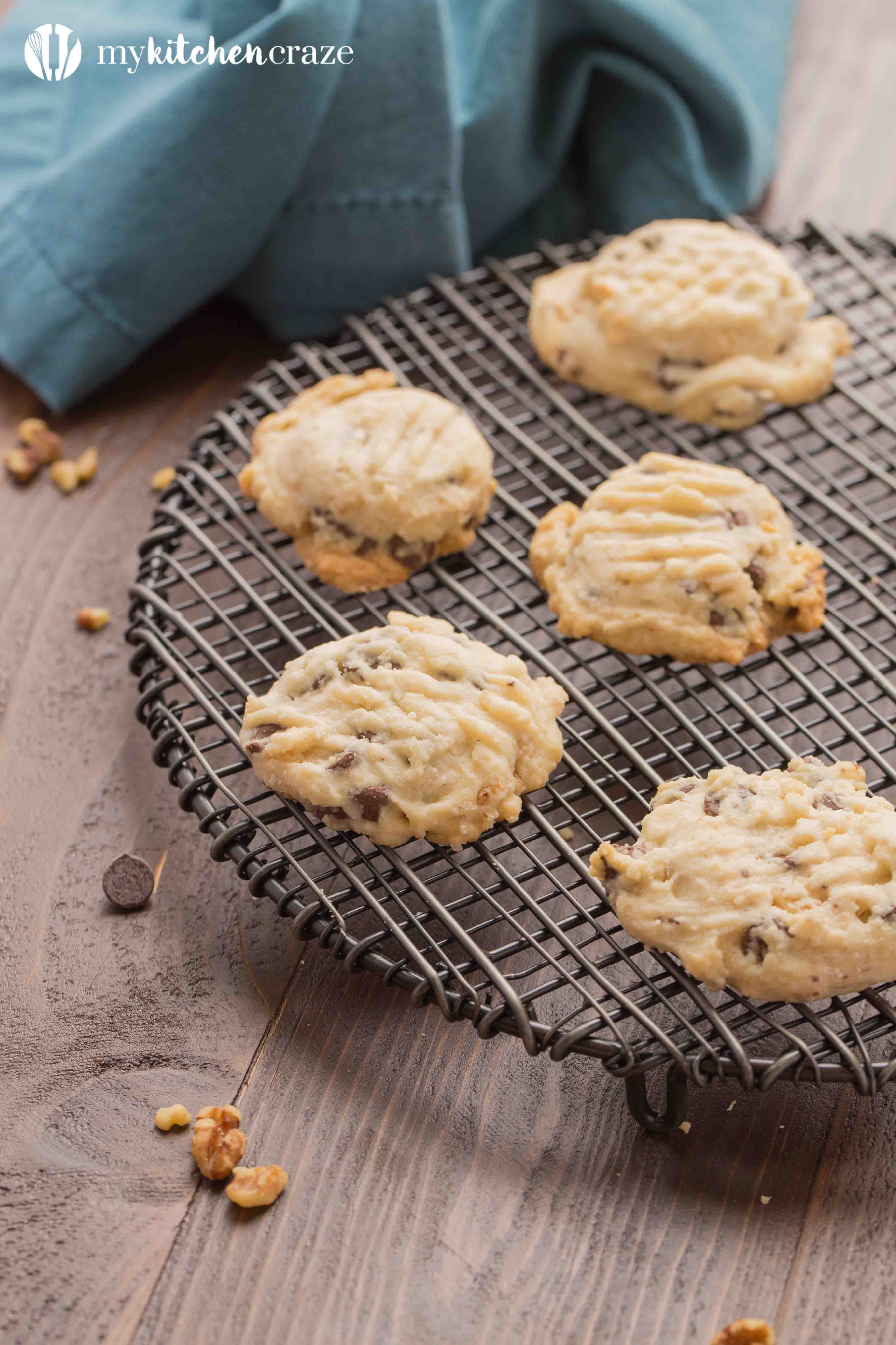 Chocolate Chip Tea Cake Cookies ~ Grab a cup of coffee, your favorite movie and some of these Chocolate Chip Tea Cake Cookies!! They're flakey with the perfect hint of pecans & chocolate chips. You're going to love them!