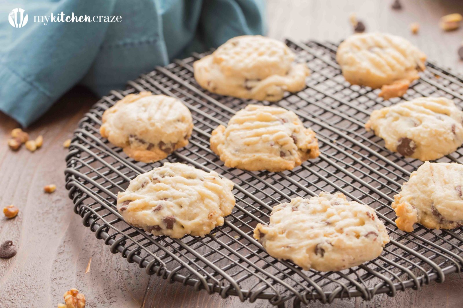 Chocolate Chip Tea Cake Cookies ~ Grab a cup of coffee, your favorite movie and some of these Chocolate Chip Shortbread Cookies!! They're flakey with the perfect hint of pecans & chocolate chips. You're going to love them!