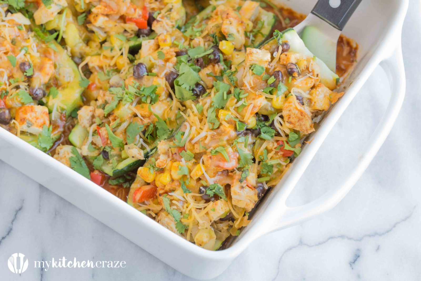 Chicken Enchilada Zucchini Boats are filled with all the same delicious flavors as regular enchiladas, but are healthier! Loaded with tons of veggies and yummy flavors, these enchiladas are great for dinner!