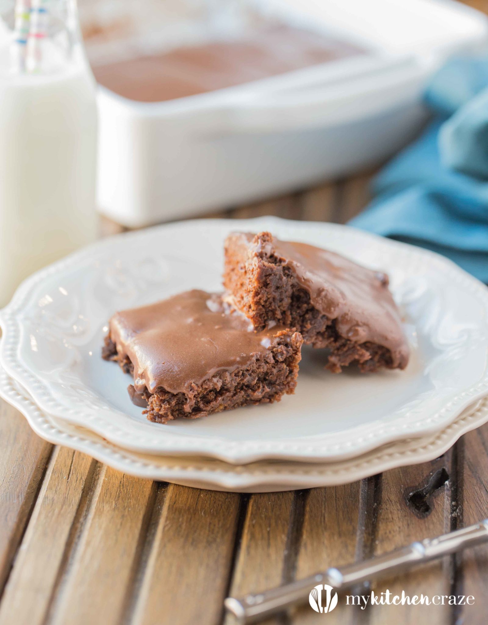 Frosted Brownies are a must have recipe! Brownies that are moist, delicious and the frosting takes these brownies to a whole new level. Grab that glass of milk because you'll want it with a slice of these yummy Frosted Brownies!