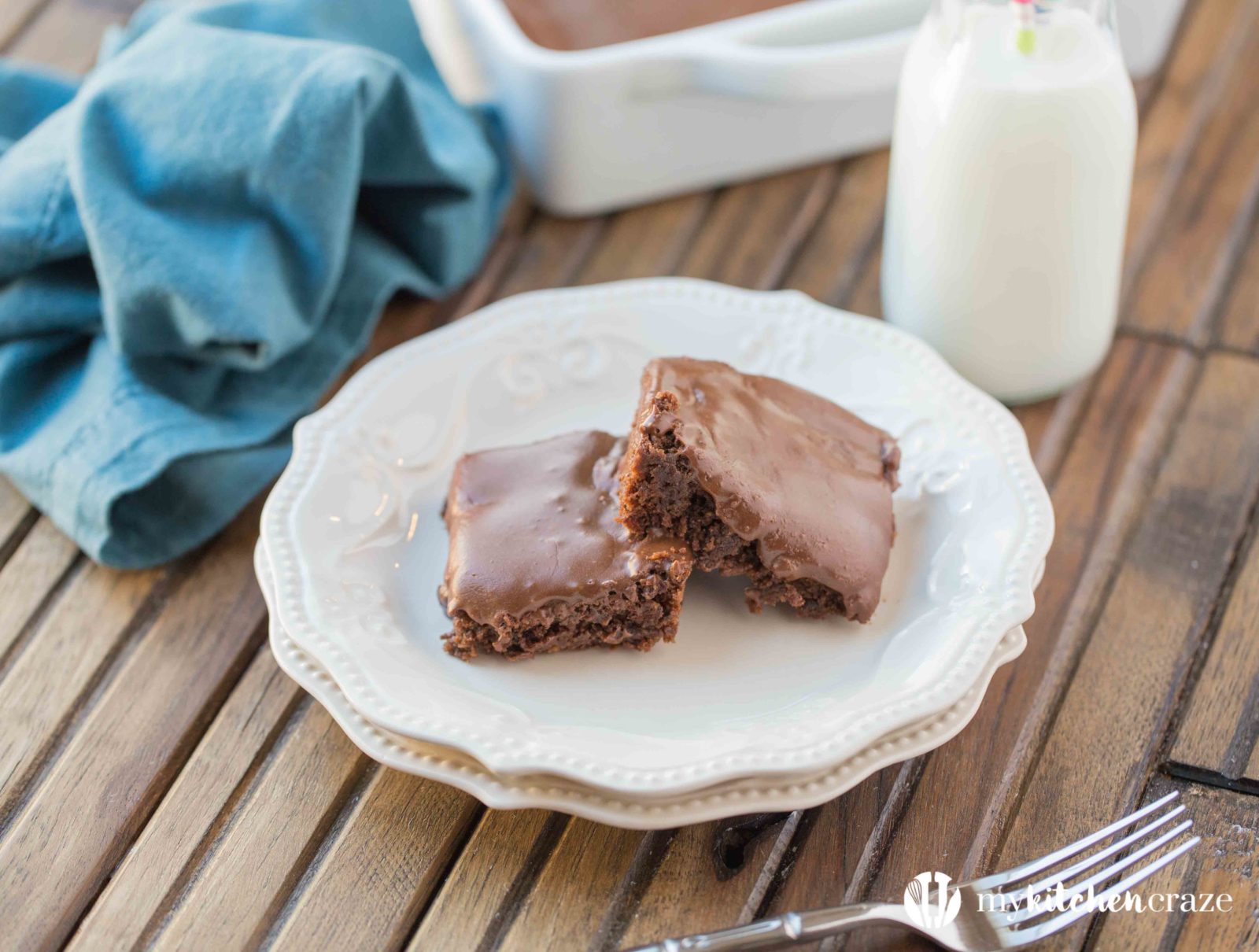 Frosted Brownies are a must have recipe! Brownies that are moist, delicious and the frosting takes these brownies to a whole new level. Grab that glass of milk because you'll want it with a slice of these yummy Frosted Brownies!