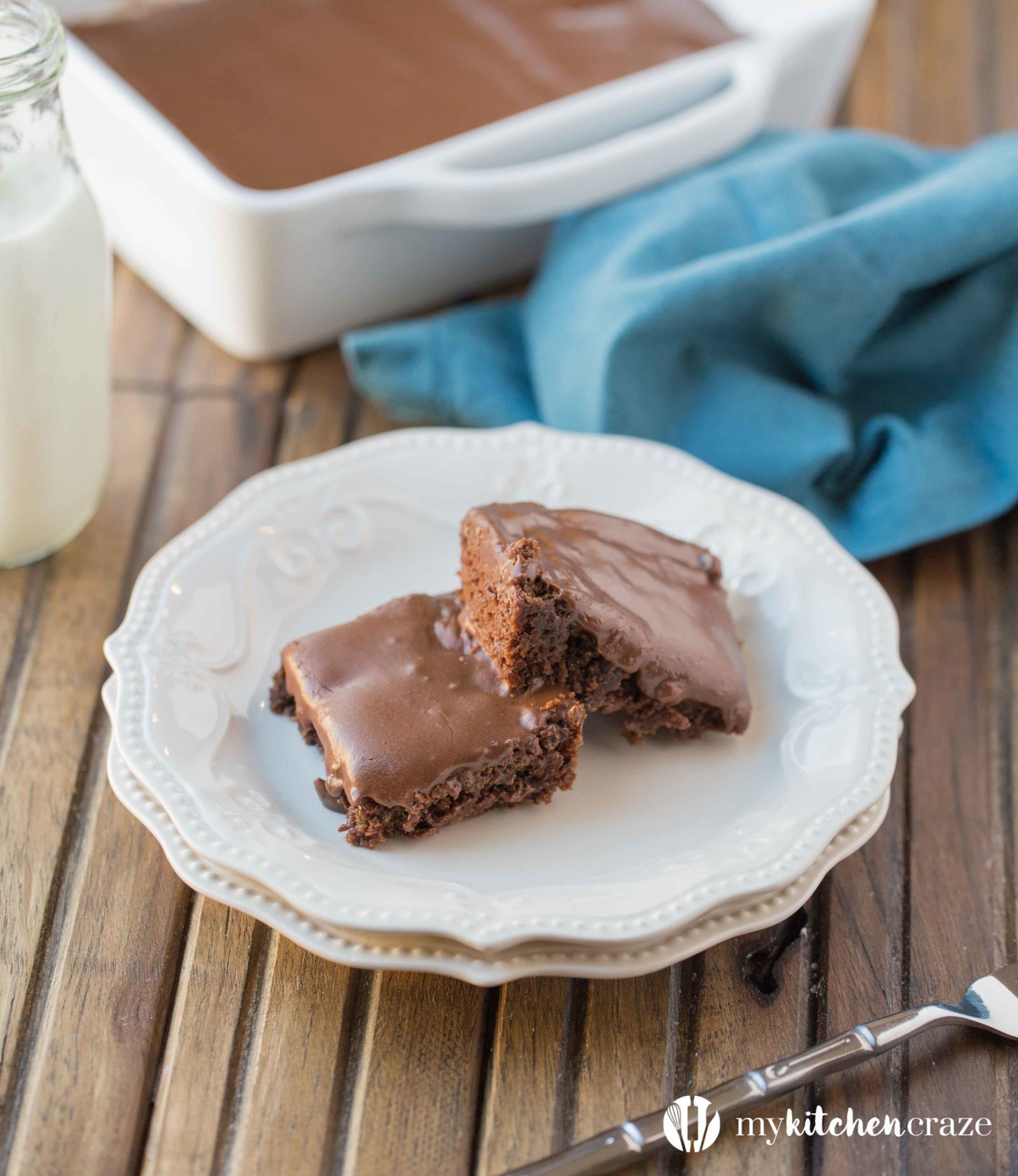 Frosted Brownies are a must have recipe! Brownies that are moist, delicious and the frosting takes these brownies to a whole new level. Grab that glass of milk because you'll want it with a slice of these yummy Frosted Brownies!